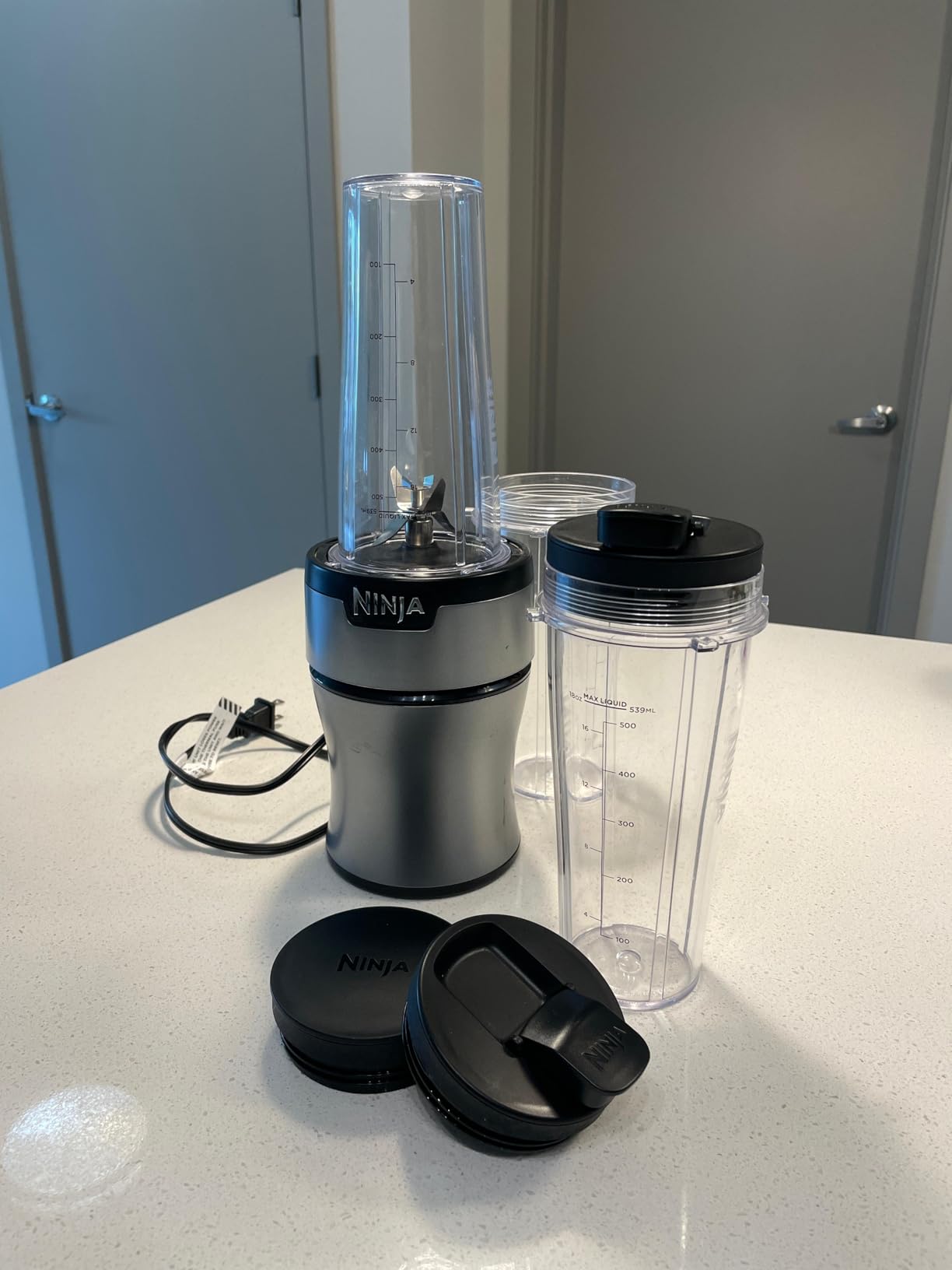 Ninja Fit Compact Personal Blender | For Smoothies, Shakes & Frozen Drinks | (2) 16-oz. To-Go Cups with Spout Lids | 700-Watt Countertop | Black | QB3001SS customer photo 1