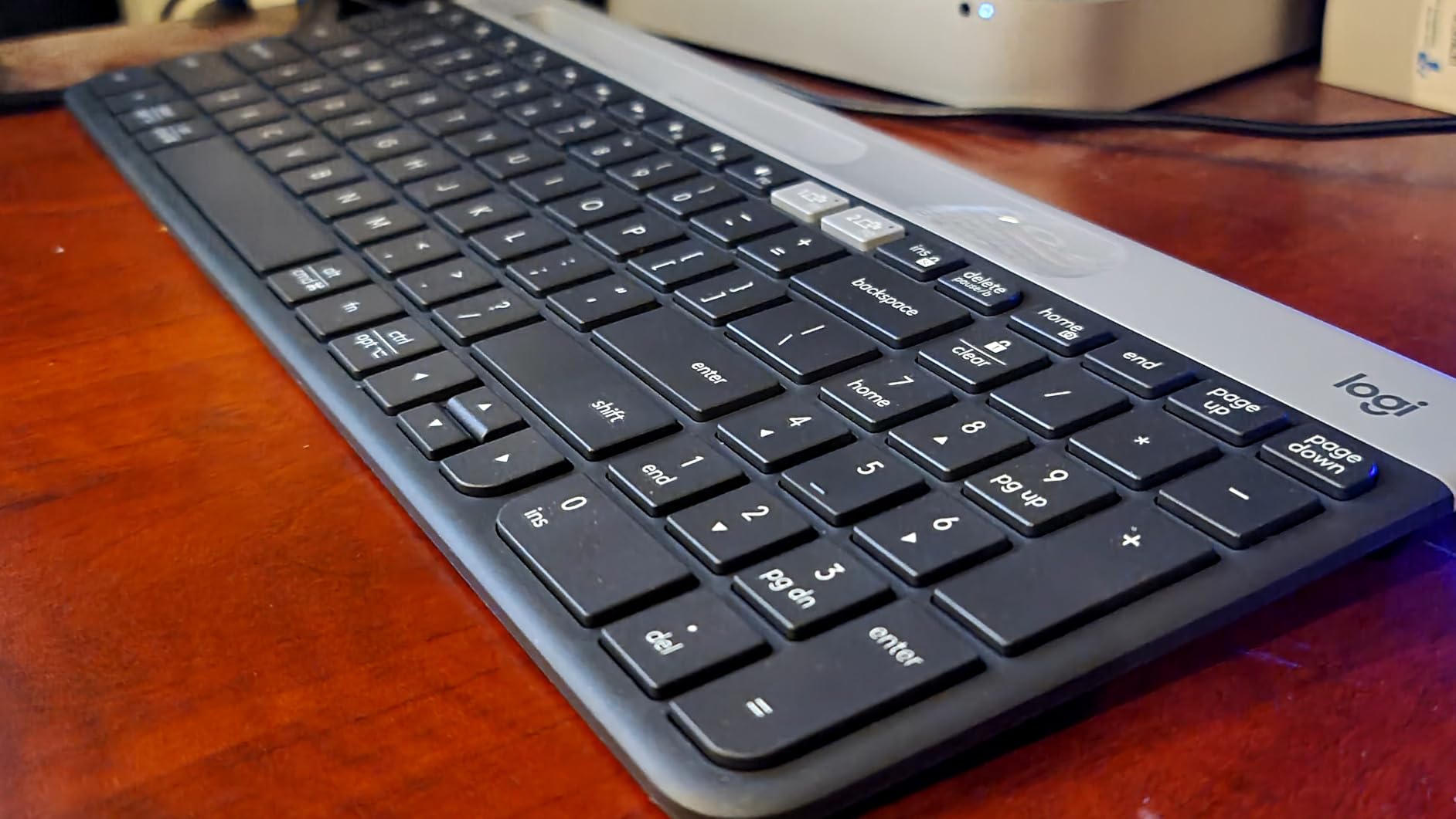 Logitech K585 Multi-Device Slim Wireless Keyboard, Built-in Cradle for Device; for Laptop, Tablet, Desktop, Smartphone, Win/Mac, Bluetooth/Receiver, Compact, Easy Switch, 24 Month Battery - Graphite customer photo 1