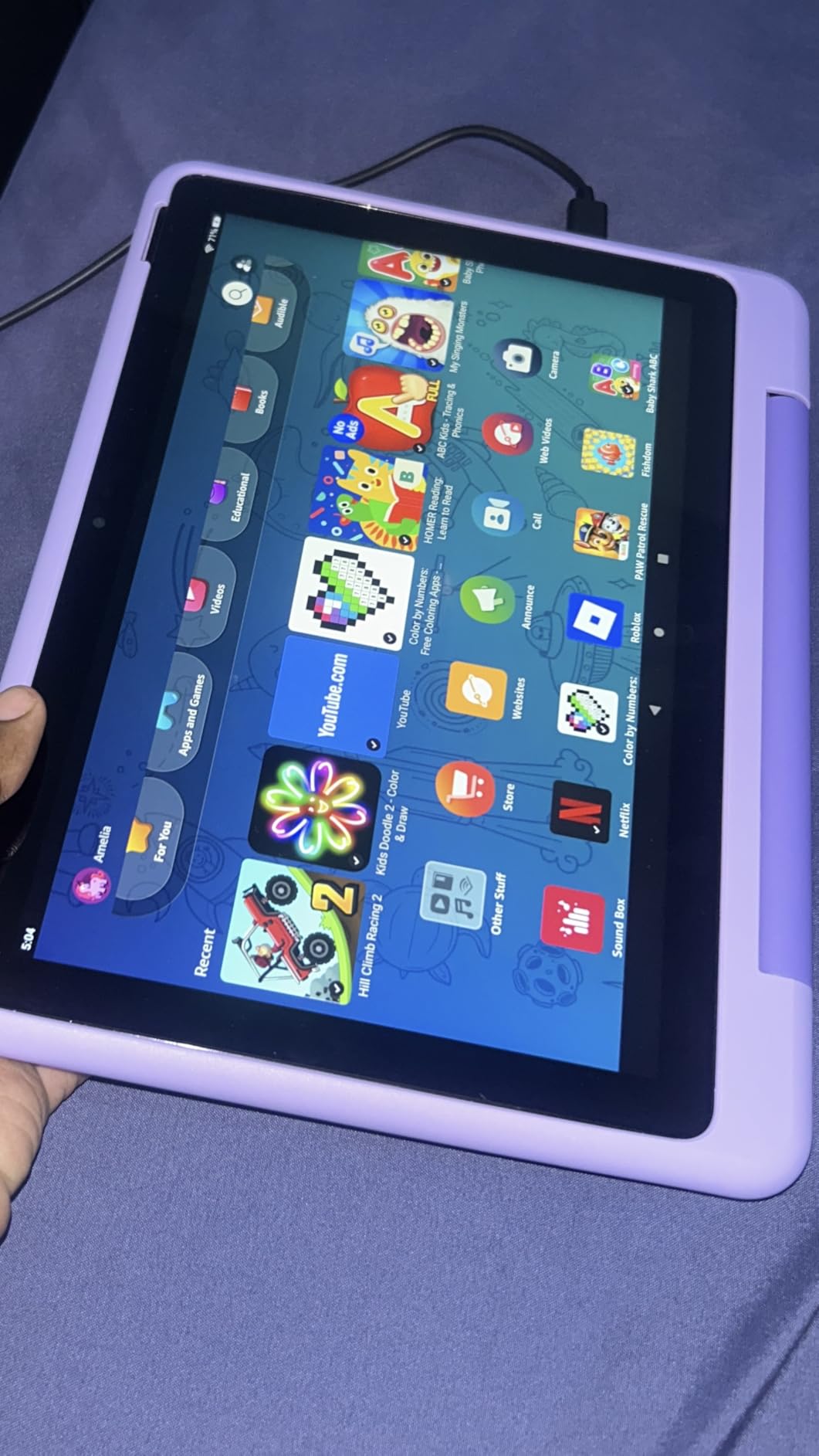 Fire HD 10 Kids Pro tablet, ages 6-12. Bright 10.1 inch HD screen, includes ad-free content, robust parental controls, 13-hr battery and slim case for older kids, 32 GB, Happy Day customer photo 2