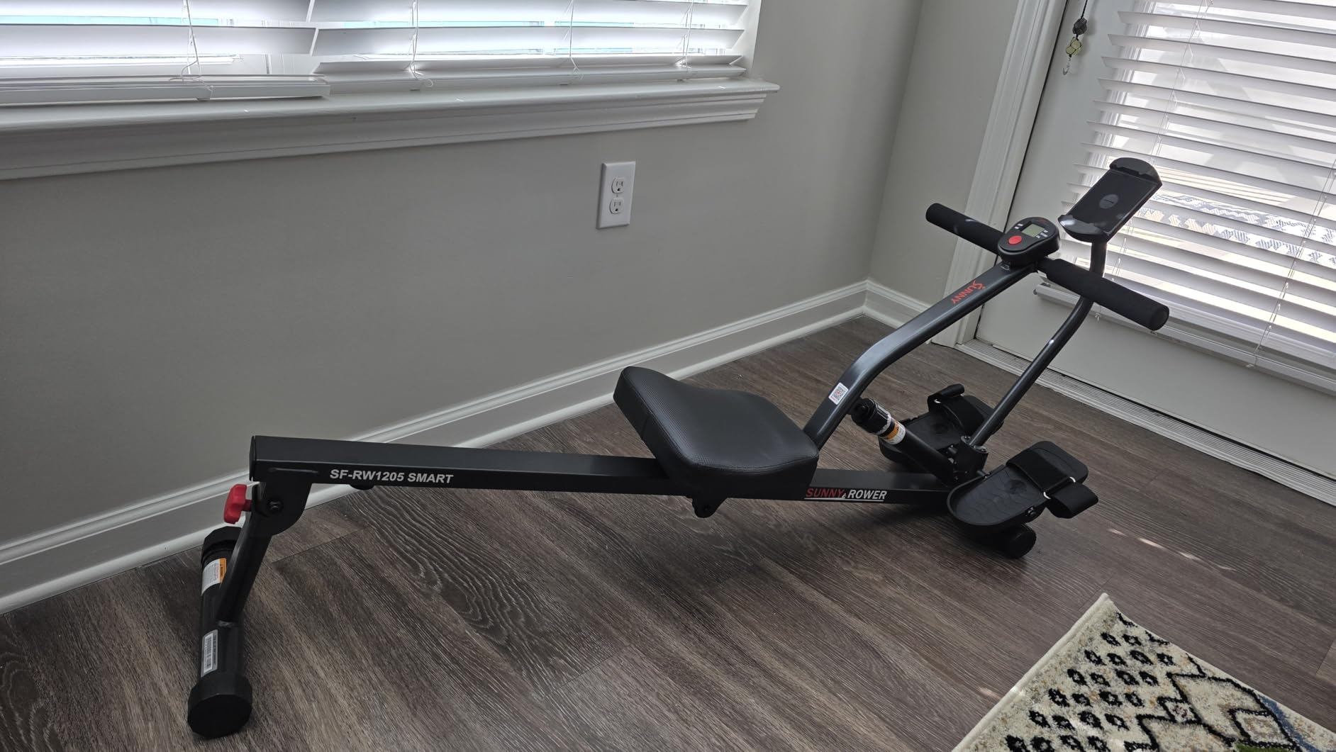 Sunny Health & Fitness Compact Adjustable Rowing Machine with 12 Levels of Resistance for Complete Body Workouts and Optional Free SunnyFit App Enhanced Connectivity customer photo 1