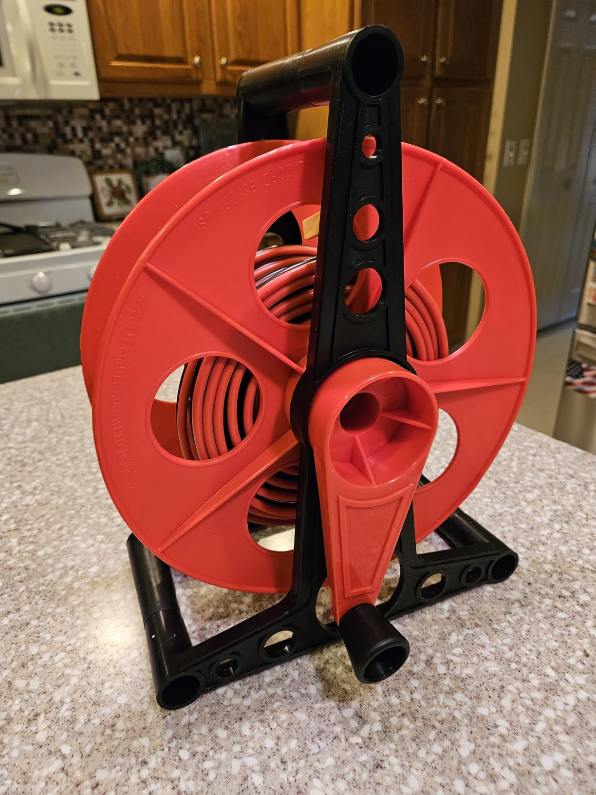 Woods Extension Cord Storage Reel - Holds Up to 150 Feet of 16/3 or 125 Feet of 14/3 Gauge Cord - Tangle-Free Design for Indoor or Outdoor Use - Side-Mounted Crank - Red & Black customer photo 2