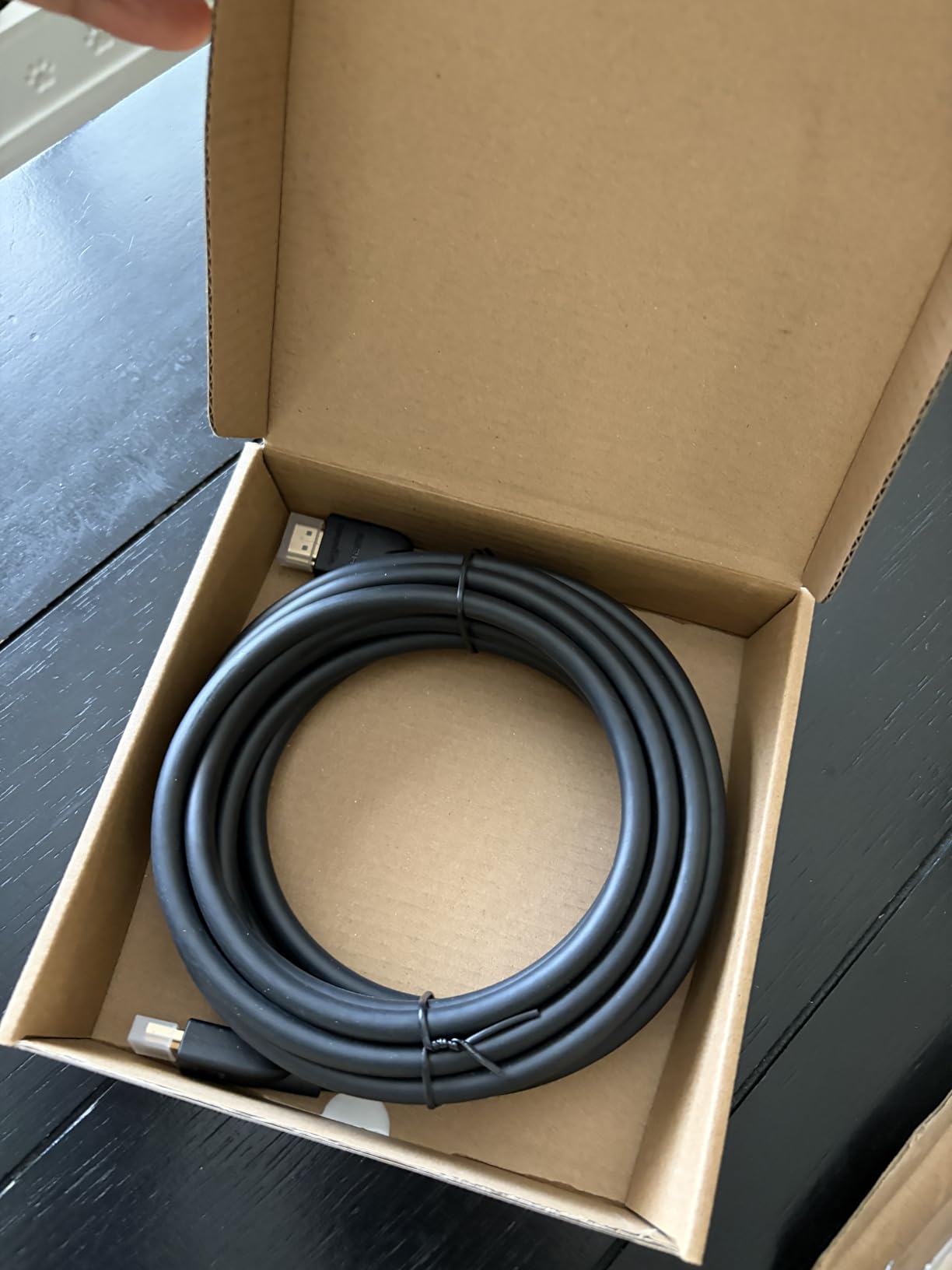 Amazon Basics HDMI 2.0 Cable with Ethernet, 25ft, 4K@60Hz, High-Speed (18Gbps), 2160p, 48 bit, Compatible with TV/PS5/Xbox/Roku/Blu-ray, Black customer photo 1