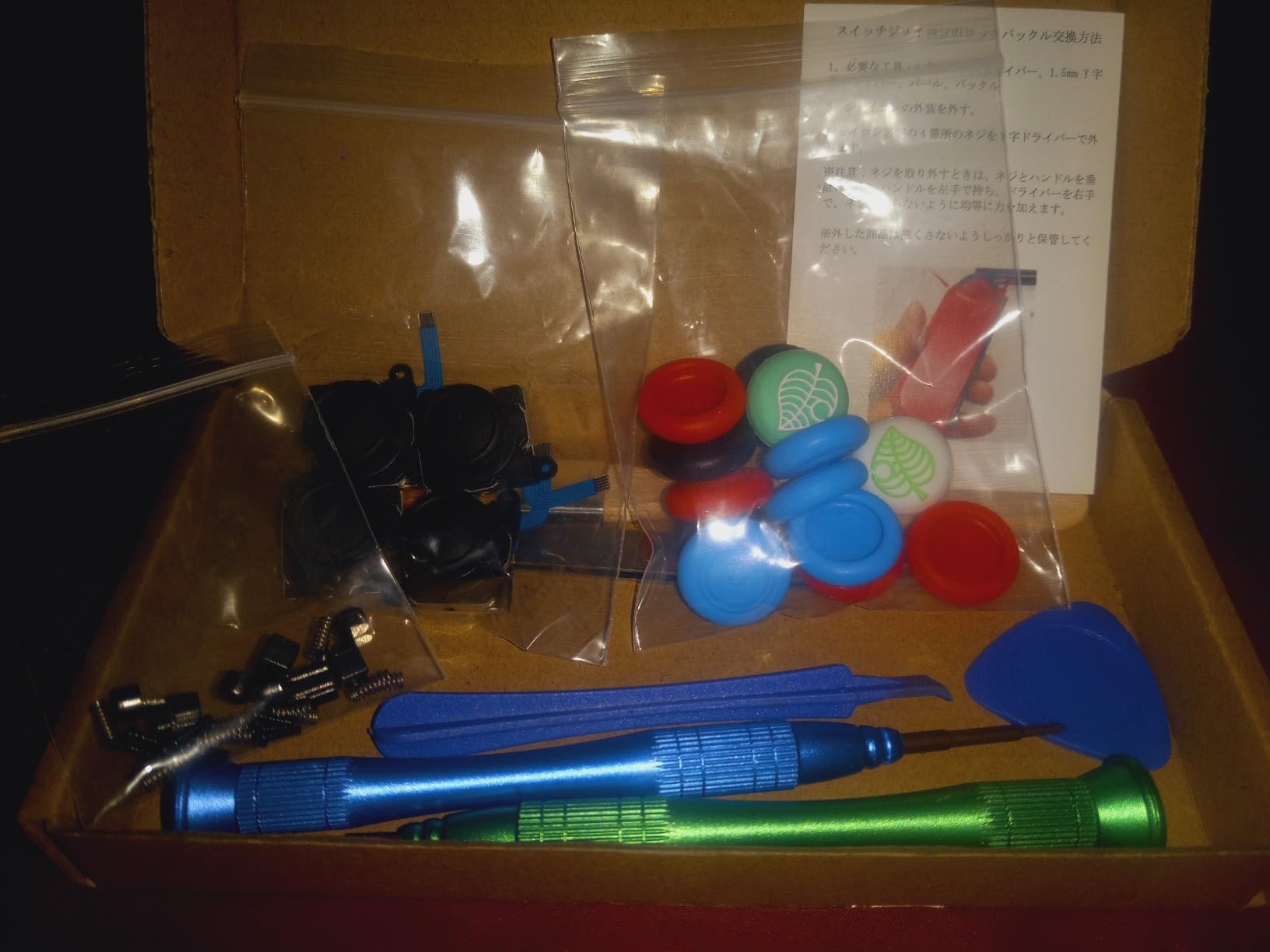 Joystick Replacement Kit for Joycon ( 48 in one), Joystick Replacement for Switch/ Switch Lite/ Switch OLED Joycon, Include 4 Thumb 3D Sticks, 4 Metal Buckles, 2 Screwdrivers, Pry Tool, 14 Thumbstick Grips customer photo 1