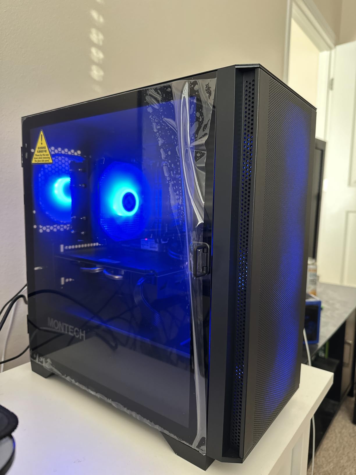 Montech AIR 100 ARGB Micro-ATX Tower with Four ARGB Fans Pre Installed, Ultra-Minimalist Design, Fine Mesh Front Panel, High Airflow, Unique Side Swivel Tempered Glass, Black customer photo 1
