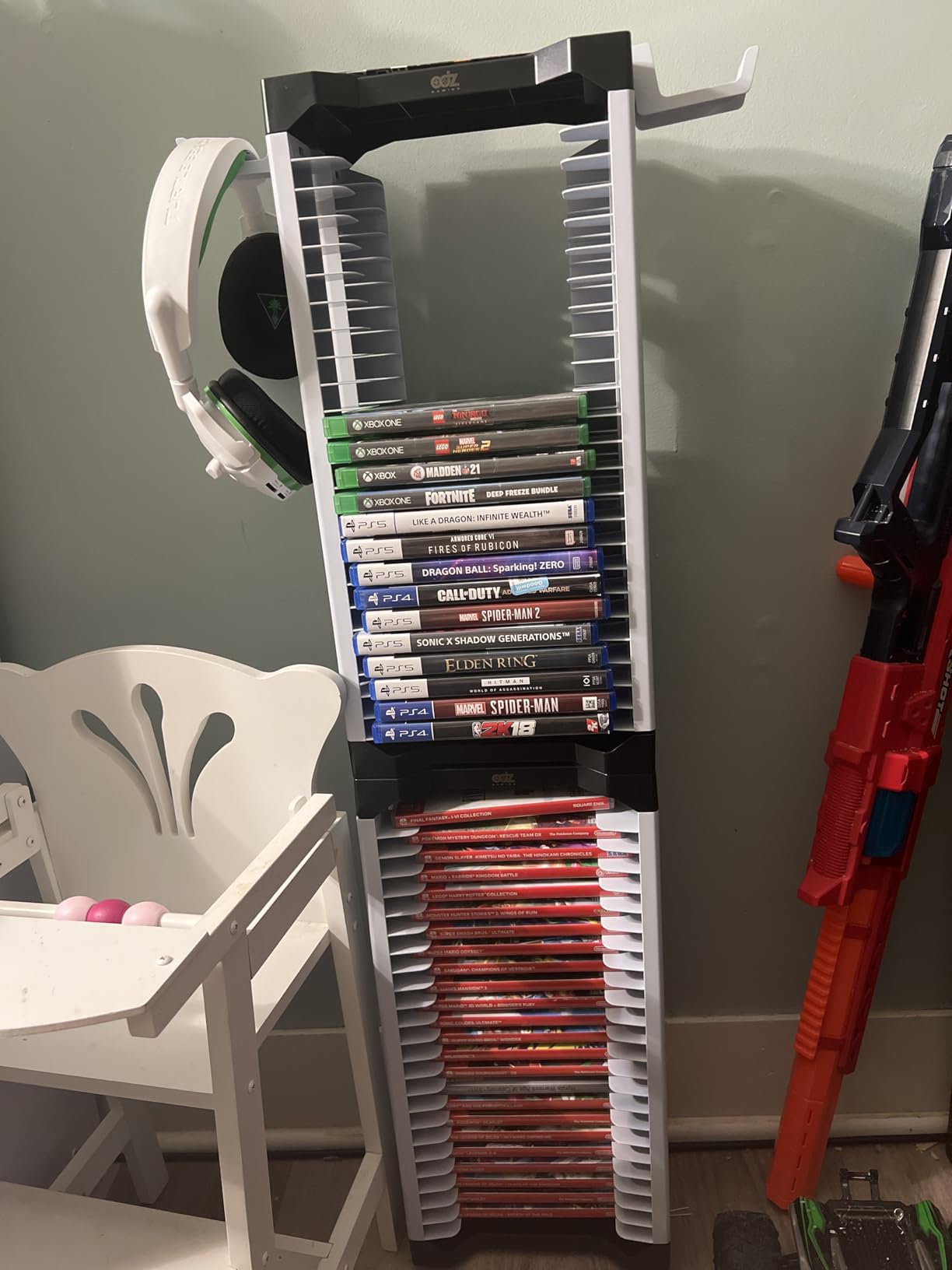 ADZ Universal Game Holder - 46 Game Storage Tower Rack for PS2 PS3 PS4 PS5 PSP Xbox 360 Xbox One Series X Wii Switch Games DVD and Blu-Ray Disks. Includes 2 Controller Mounts (White) customer photo 2