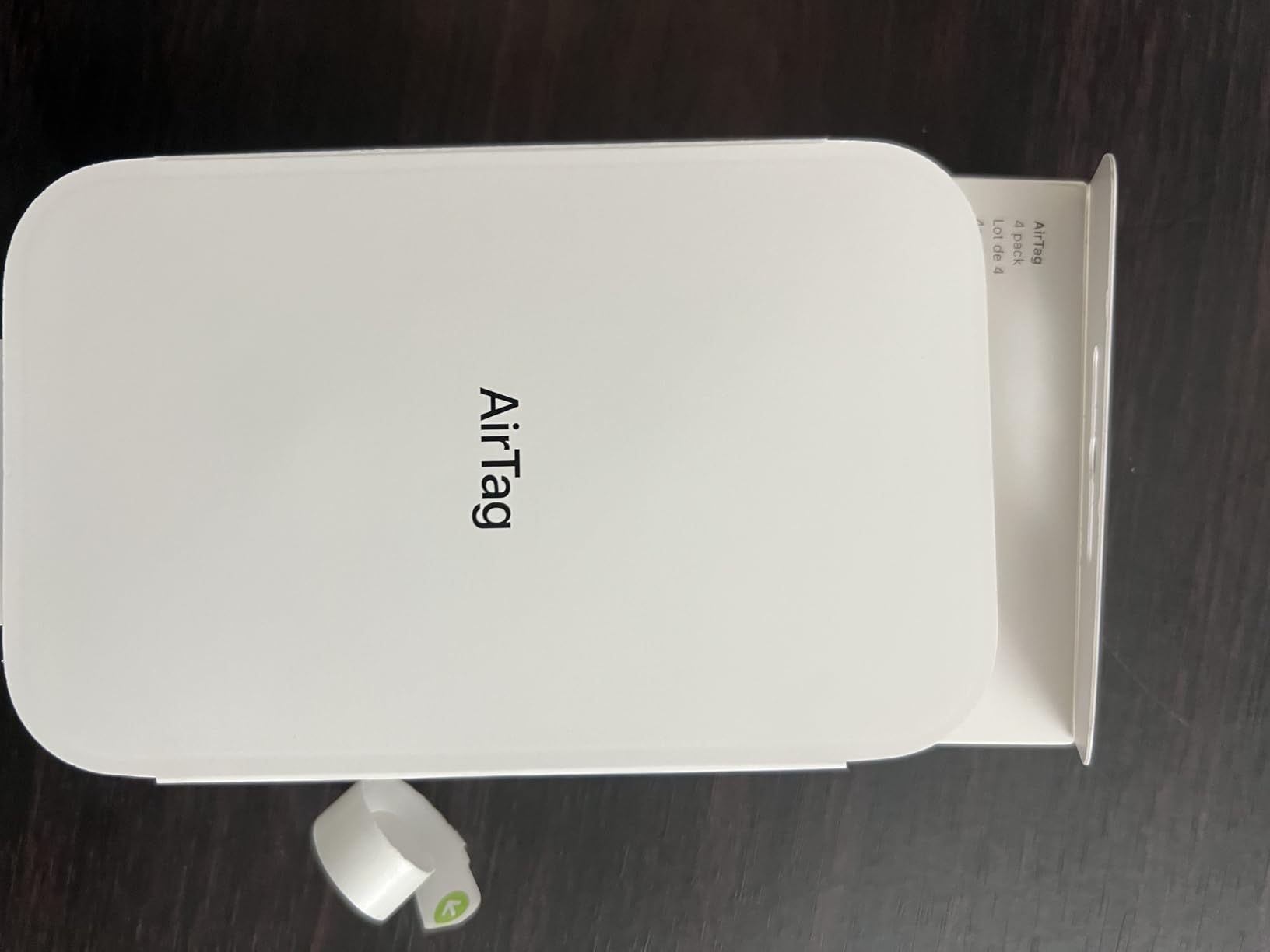 AirTag (1st Generation) - 4 Pack. Keep Track of and find Your Keys, Wallet, Luggage, Backpack, and More. Simple one-tap Set up with iPhone or iPad, Bluetooth customer photo 2