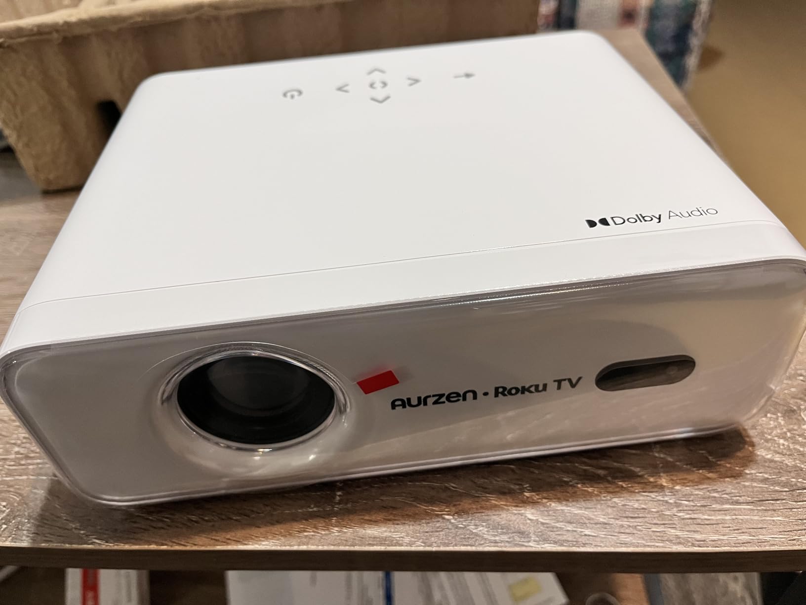 Aurzen Roku TV Smart Projector with Wifi and Bluetooth, Roku Streaming Experience Built-in, 1080P FHD, DoIby Audio, Auto Focus & Keystone, Zoom, Movie Portable Outdoor Mini Projector, White customer photo 1