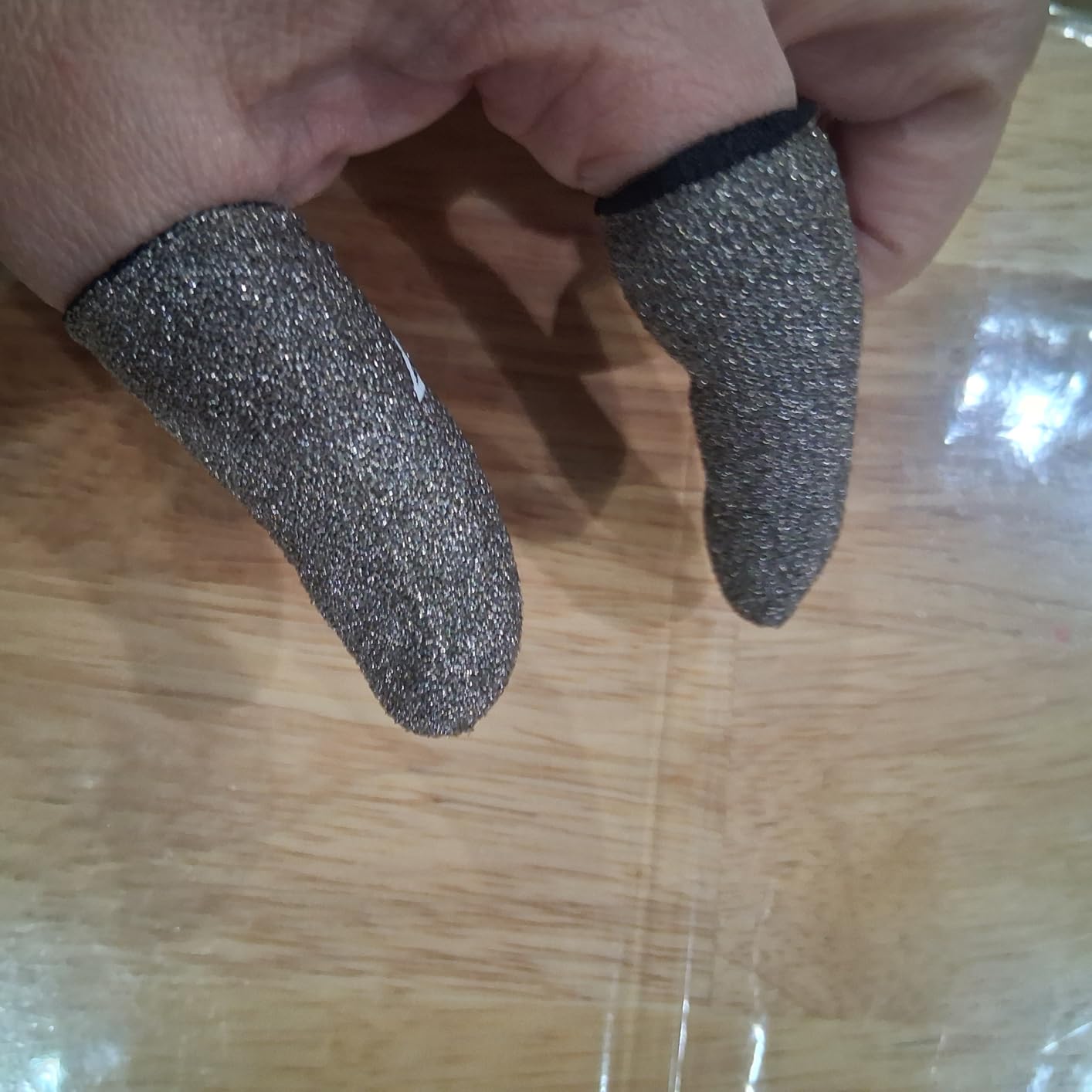 2025 Upgrade: Longer Size for 5 Fingers, Professional Pure Silver Fiber Finger Sleeves for Mobile Gaming-No More Slipping, Maximum Touch Sensitivity, Anti-Sweat,6 Pack (M) customer photo 1