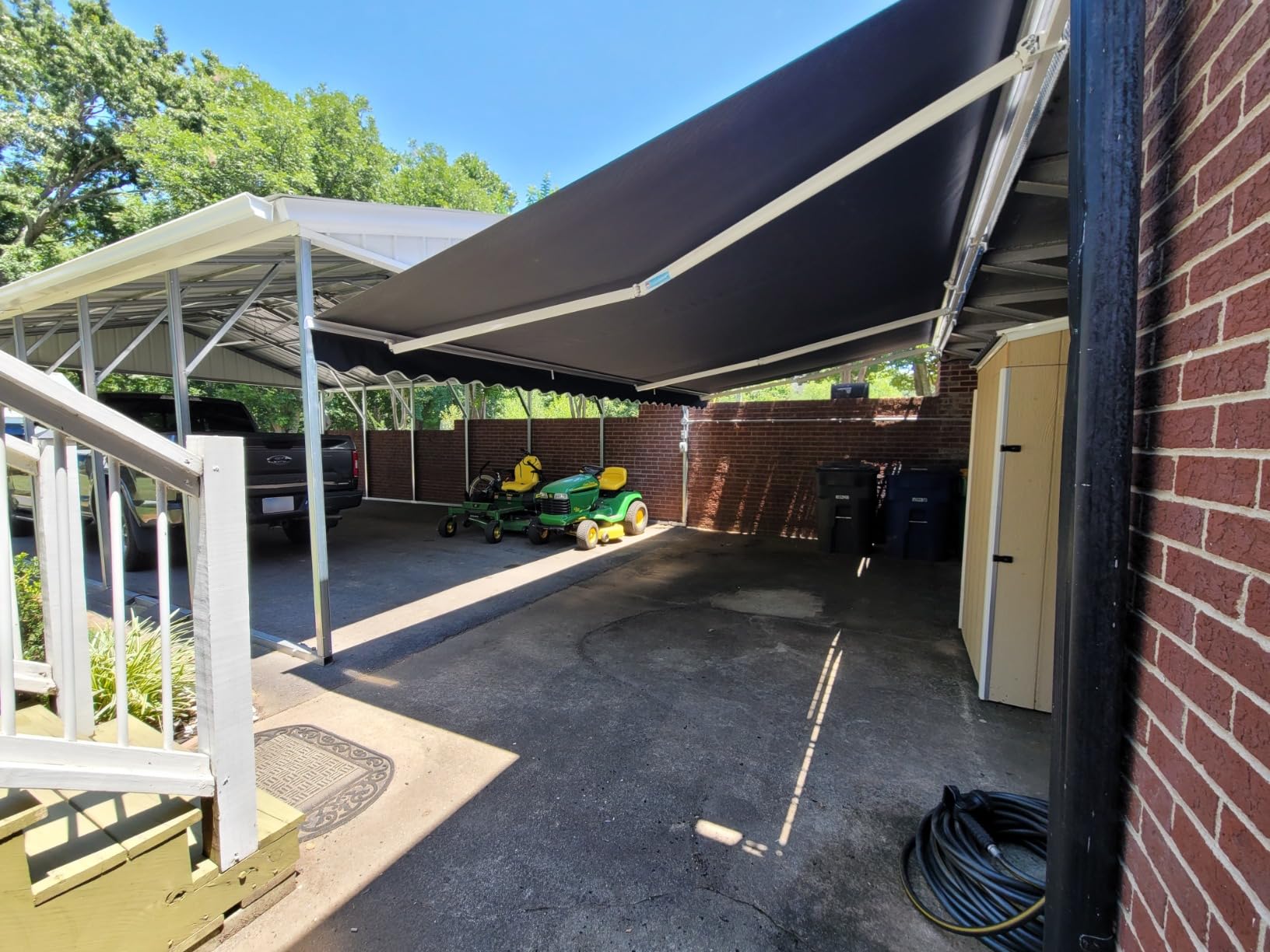 Aleko 20x10 feet Caribbean Style Electric White Frame Awning, Remote Control Motorized & Manual Crank, Outdoor Shade Canopy with UV-Resistant Fabric - Desert Sand customer photo 1