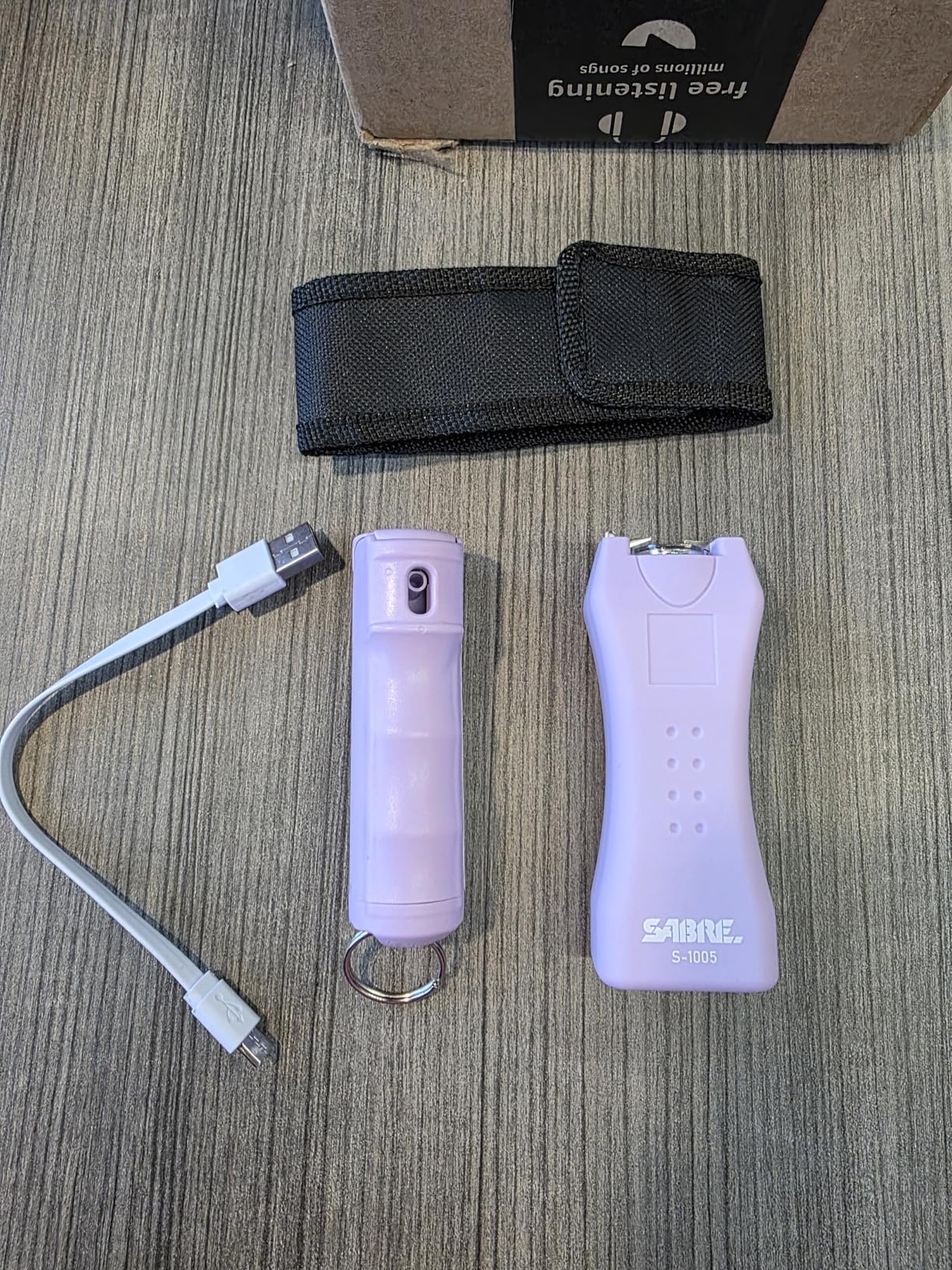 SABRE Pepper Spray & 2-in-1 Stun Gun with Flashlight, Self Defense Kit, Fast Flip Top Safety, Finger Grip for Better & Faster Aim, Painful 1.60 µC Charge, 120 Lumen LED Light, Rechargeable, 0.54 fl oz customer photo 2