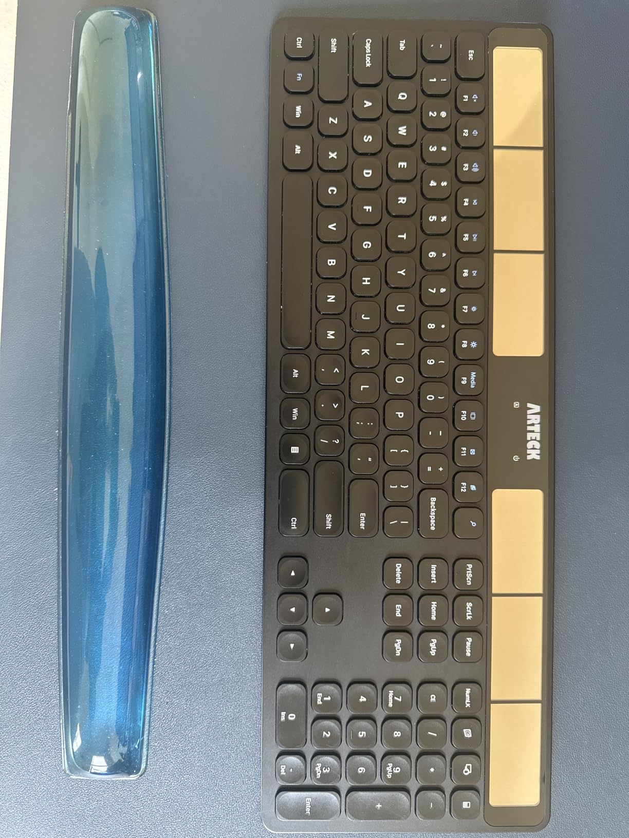 Arteck Wireless Solar Keyboard Full Size Solar Recharging Keyboard for Computer/Desktop/PC/Laptop/Surface/Smart TV and Windows 10/8 / 7 / Vista/XP Built in Rechargeable Battery customer photo 1
