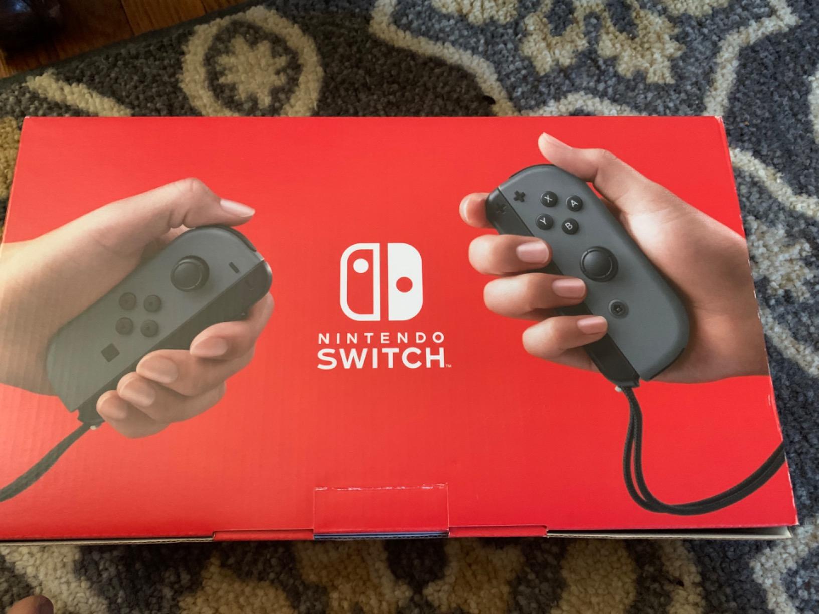 Nintendo Switch w/ Gray Joy-Con + Mario Kart 8 Deluxe (Full Game Download) - Switch customer photo 1