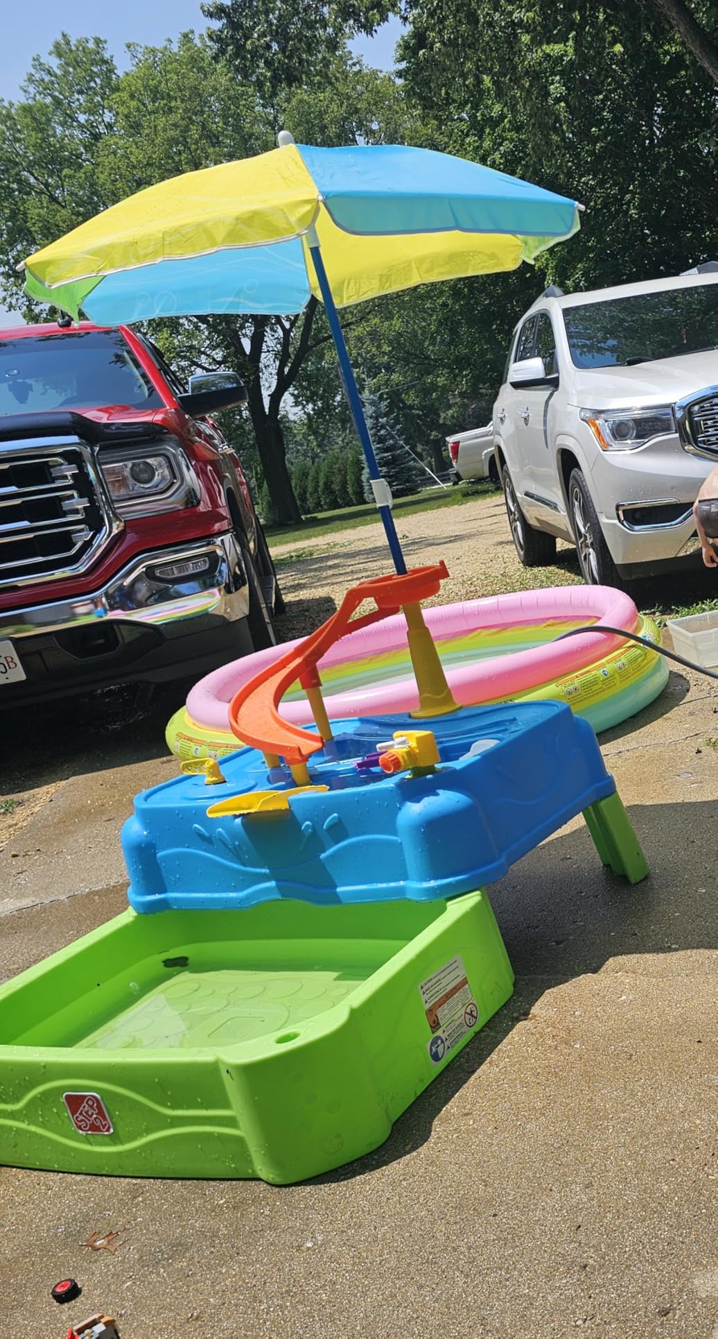 Step2 Waterpark Wonders Two Tier Water Table, Kids Water Activity Sensory Playset with Umbrella, Garden Hose Sprinkler Attachment, 11 Piece Accessories, Outdoor Summer Toy, Ages 18 Months+, Blue customer photo 1