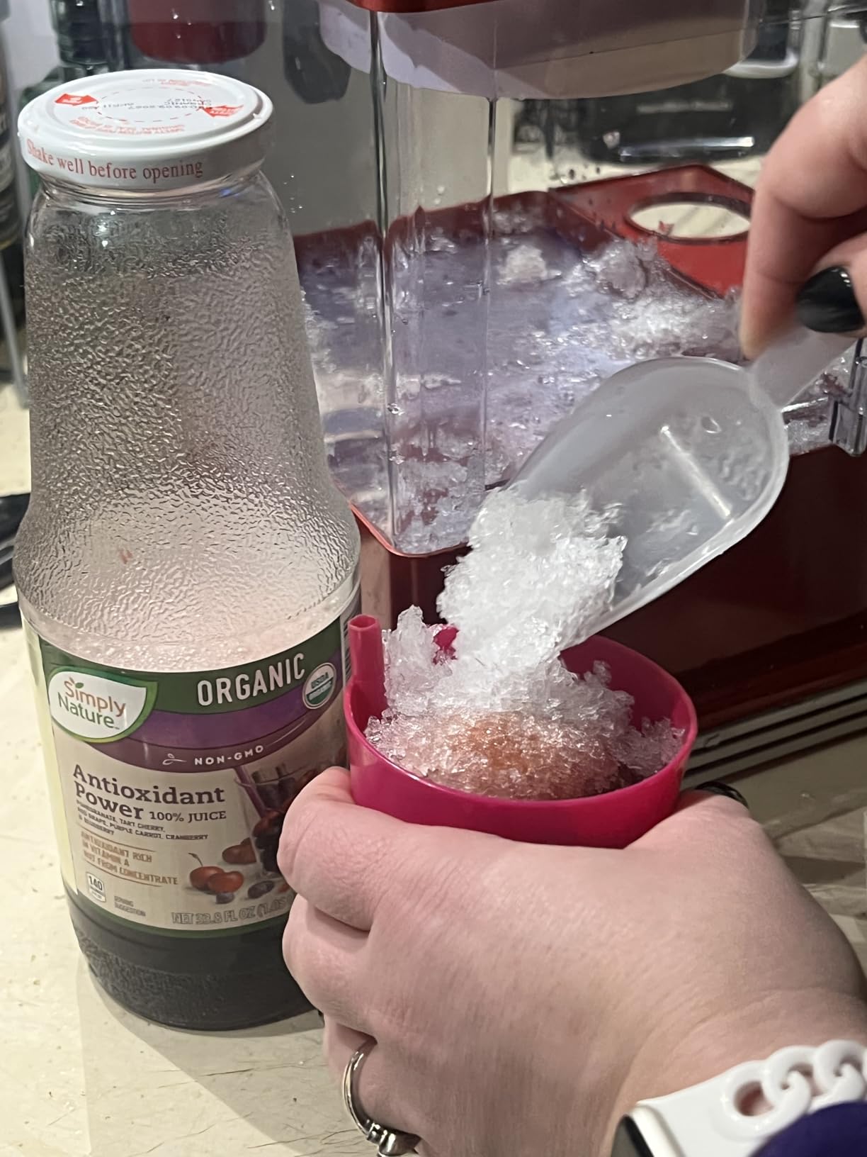 Nostalgia Snow Cone Machine With 2 Reusable Plastic Cups & Ice Scoop for Easy Serving- Retro Table-Top Ice Cone Maker Makes 20 Icy Treats- Slushie Machine for Parties, Family Treats & Gatherings- Aqua customer photo 1