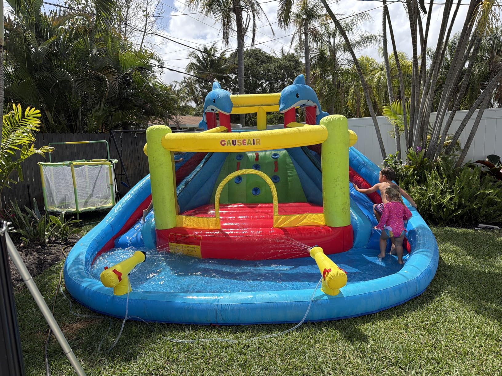 Causeair Inflatable Bounce House with Slide,Dolphin Styling,Splashing Pool,Double Water Cannon,Climbing Wall,Heavy Duty GFCI Blower,Inflatable Water Park Slide for Kids Backyard Summer customer photo 1