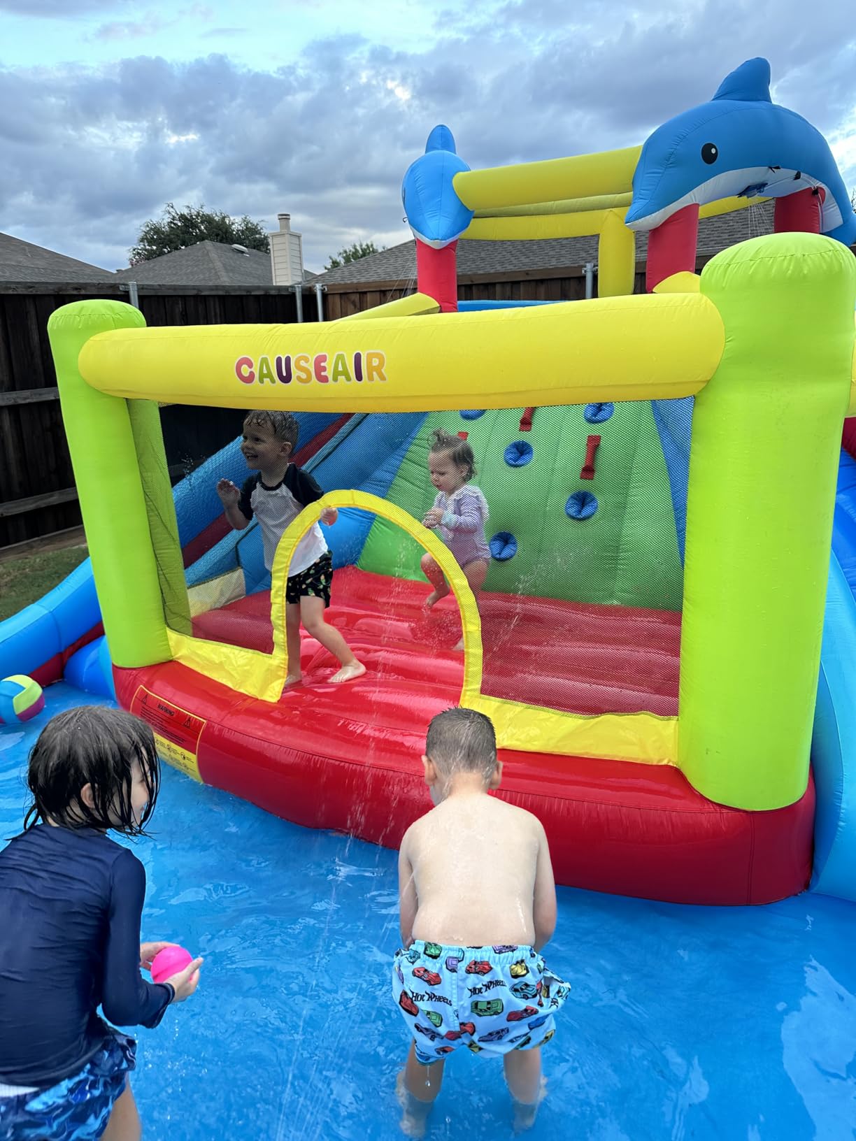 Causeair Inflatable Bounce House with Slide,Dolphin Styling,Splashing Pool,Double Water Cannon,Climbing Wall,Heavy Duty GFCI Blower,Inflatable Water Park Slide for Kids Backyard Summer customer photo 2