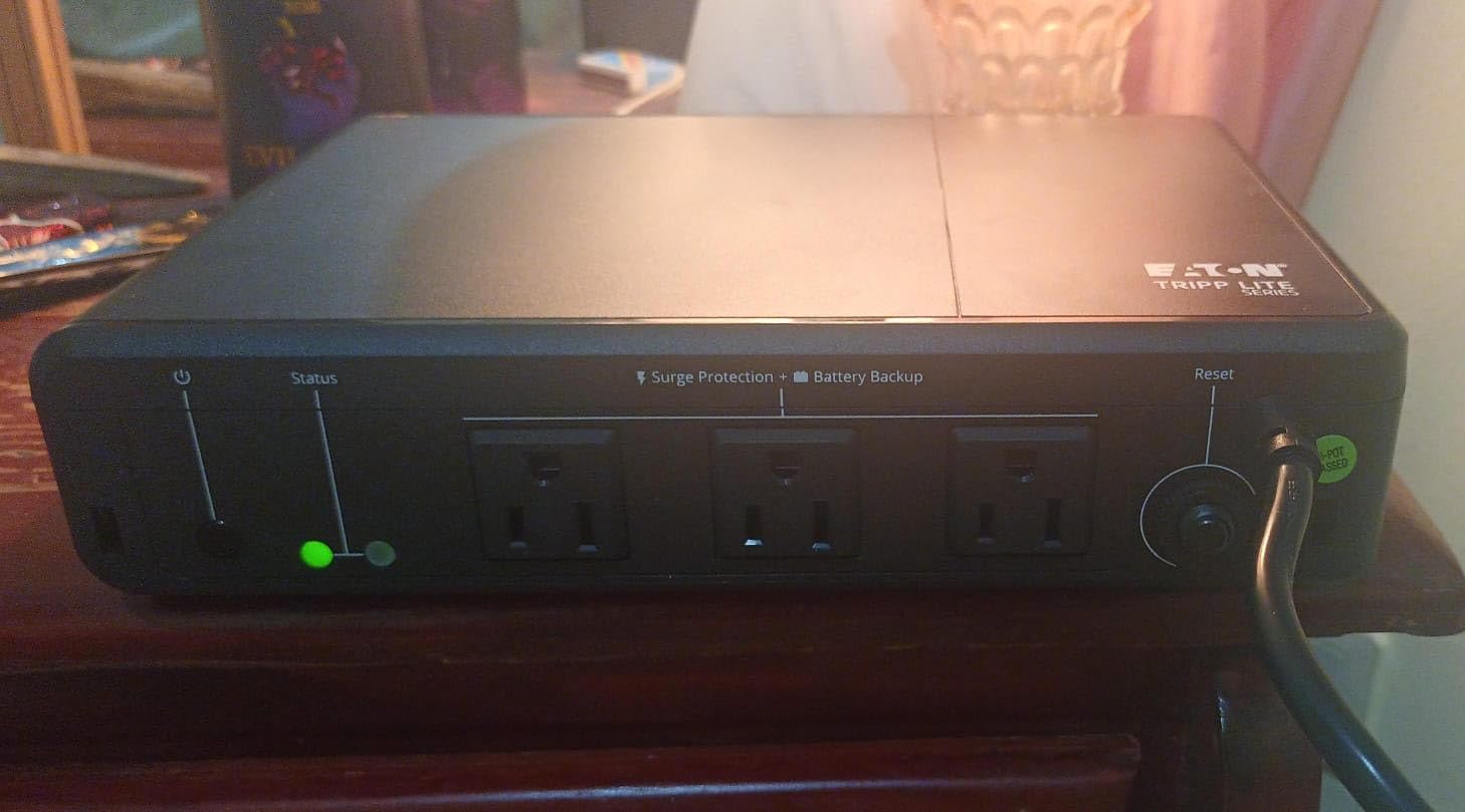 Tripp Lite 350VA UPS Desktop Battery Backup and Surge Protector, 210W, 3 Outlets, Home & Office UPS, Small Form Factor, Wall Mounting Option, 5ft Cord, 3-Year Warranty (BC350R) customer photo 1