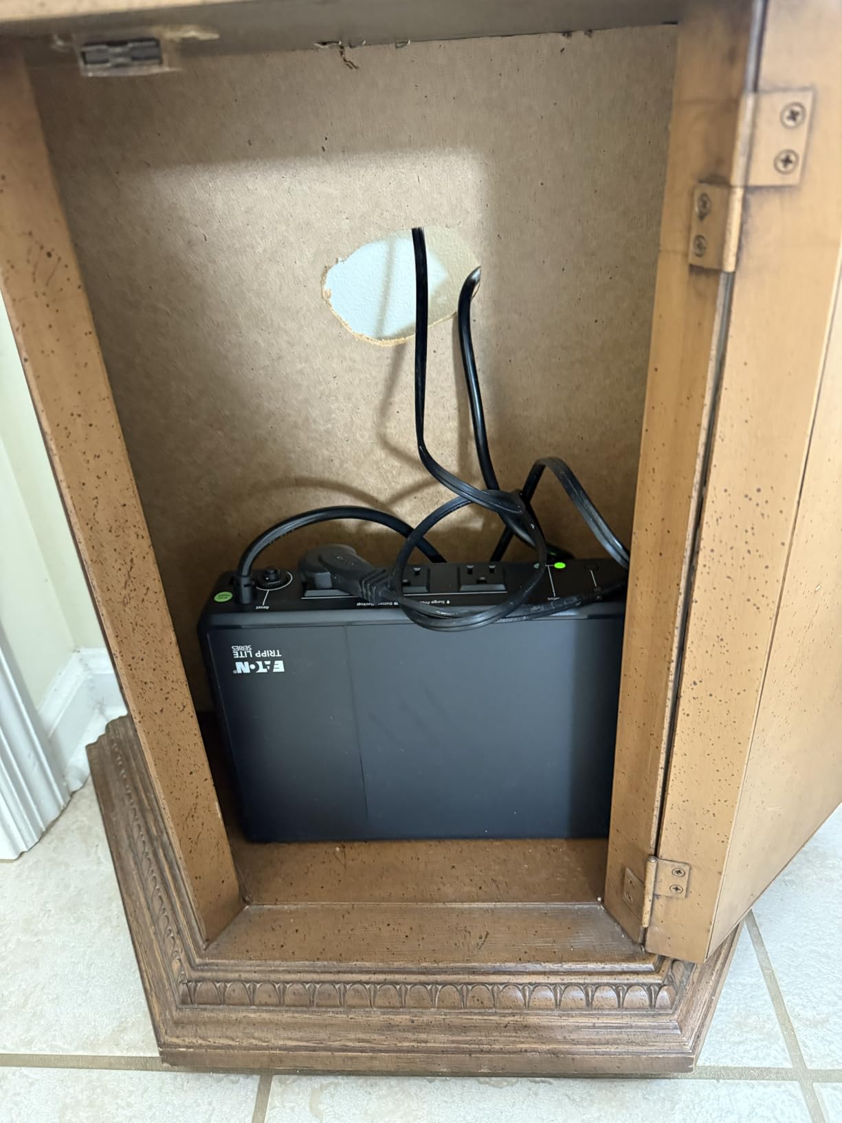 Tripp Lite 350VA UPS Desktop Battery Backup and Surge Protector, 210W, 3 Outlets, Home & Office UPS, Small Form Factor, Wall Mounting Option, 5ft Cord, 3-Year Warranty (BC350R) customer photo 2