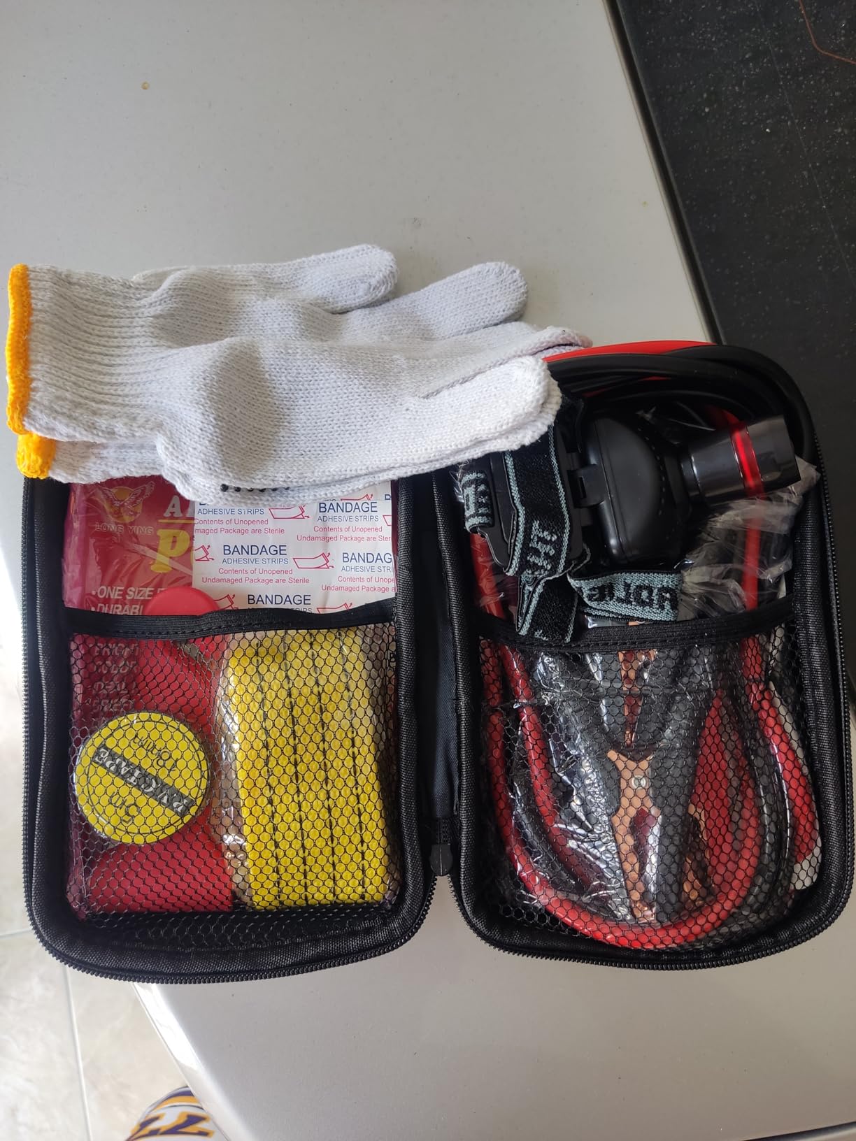 LIANXIN Car Roadside Emergency Kit, with Jumper Cables Automotive Kit,Car Safety Roadside Assistance Kit Headlamp,Tow Straps, Safety Hammers, Rainwear, Gloves.Black customer photo 2