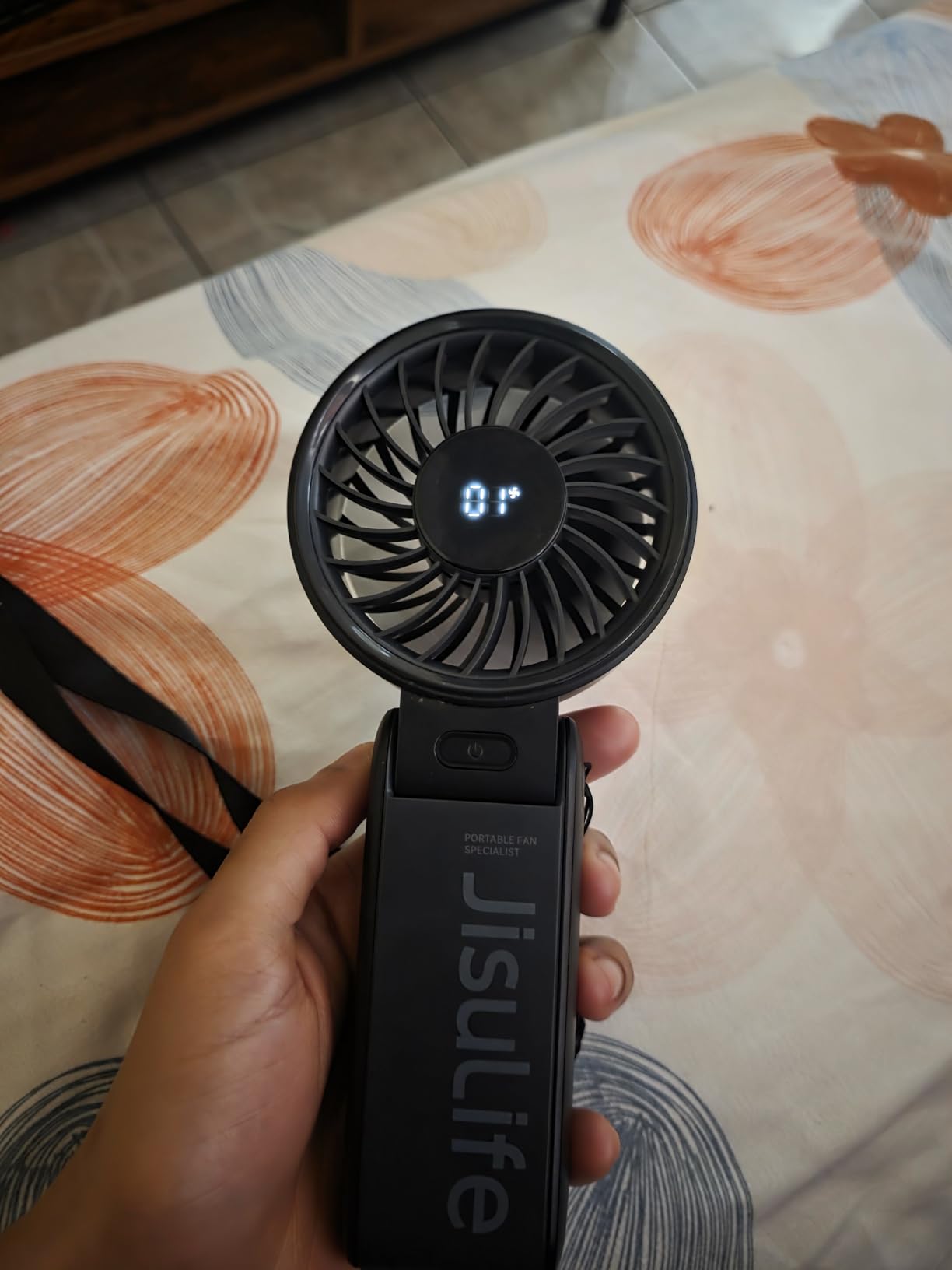 JISULIFE Handheld Fan Life7 - Ultimate Flexibility: High-Power Motor, LED Display, 19.5 Hrs Cooling, 5000mAh Rechargeable, 5-Speed, Foldable Design, 3-IN-1 Portable Fan for Travel Cruise Beach(Black) customer photo 1
