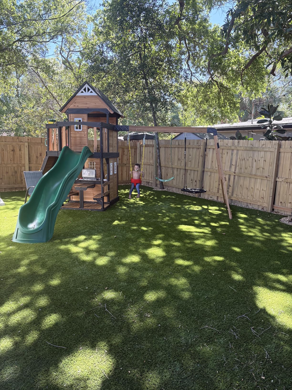 Backyard Discovery Canyon Creek White Cedar Wood Swing Set with Wave Slide, Clubhouse, Play Kitchen, Picnic Area, Belt Swings, Web Swing, Rock Wall, Balconies, Playhouse, Step Ladder, Outdoor Playset customer photo 1