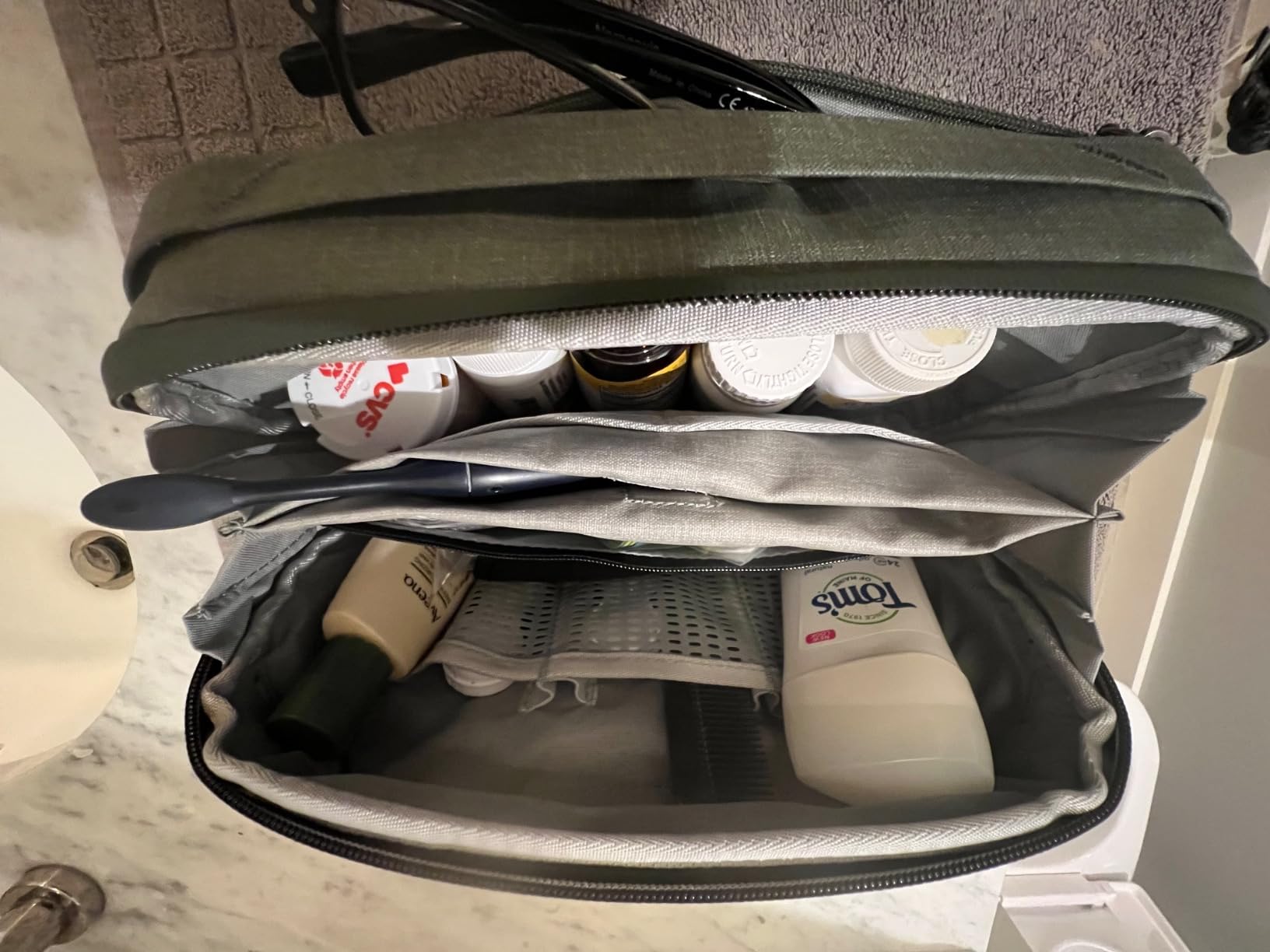 Peak Design Wash Pouch, Coyote, Ocean Edition - Travel Toiletry Bag, Upright or Hanging Dopp Kit with Pockets, Magnetic Toothbrush Pocket, Wide UltraZip Opening customer photo 1