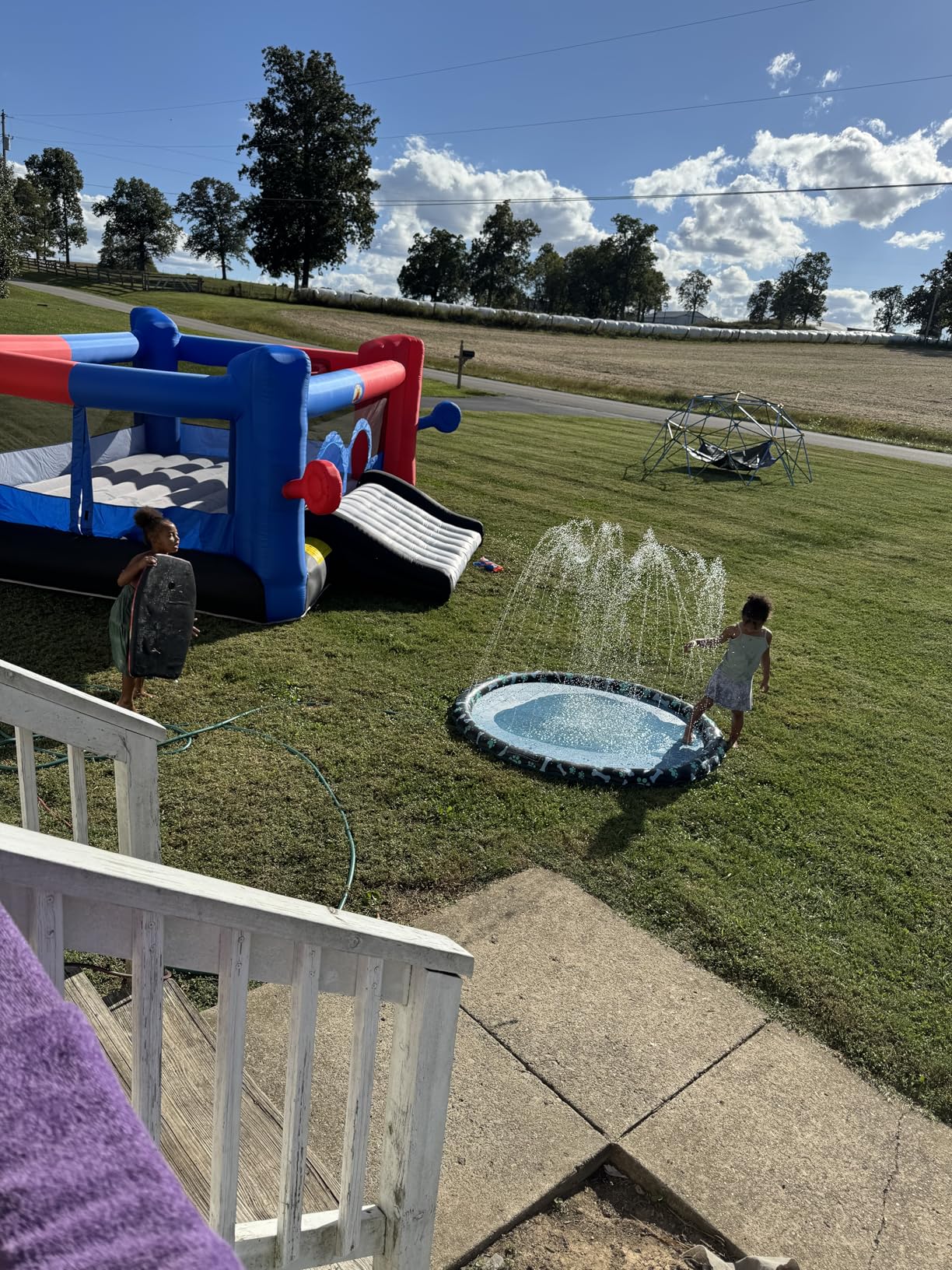 WELLFUNTIME Inflatable Bouncy Castle & Bounce House with Slide, 15.3ft x 14.7ft, Jumping Castle with Blower, Dartboard, Dual Basketball Hoop, Dual Kicking Boards, Jumping Area for 6 Kids customer photo 1
