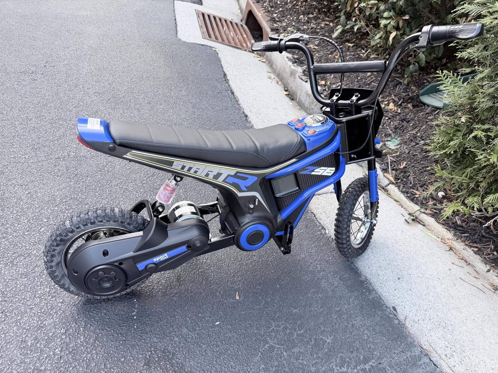 ELEMARA Electric Dirt Bike, 350W Motorcycle for Kids with Tail Lights, Music & Bluetooth, 15.5 mph & 150lb Max, Chain-Driven Motor, Twist-Grip Throttle & Hand-Operated Rear Brake, 12