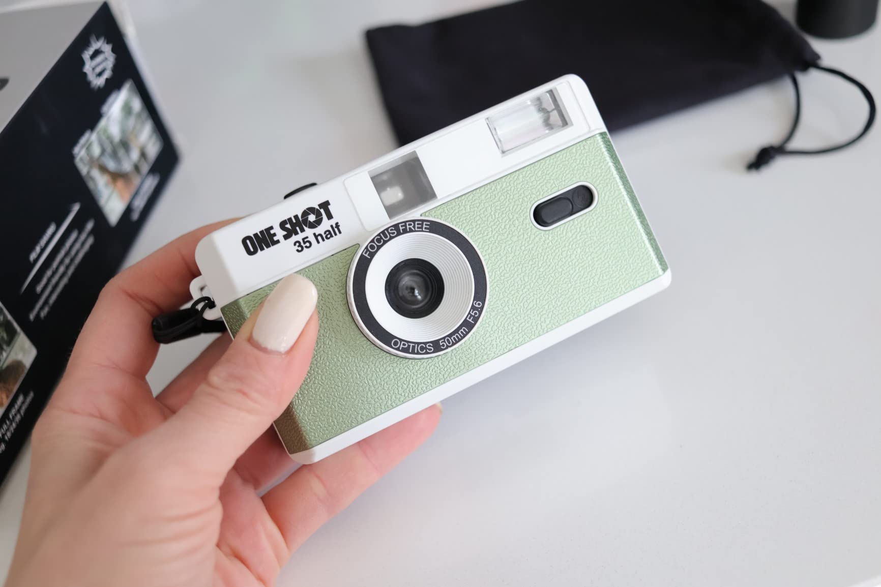 1 Shot Point and Shoot 35mm Film Camera, Reusable Retro Half Frame Camera, Built in Flash, Included One Roll ASA/ISO 400 Black & White Film 18 Exp., (36 Shots) Battery Not Included (Mocha Color) customer photo 1