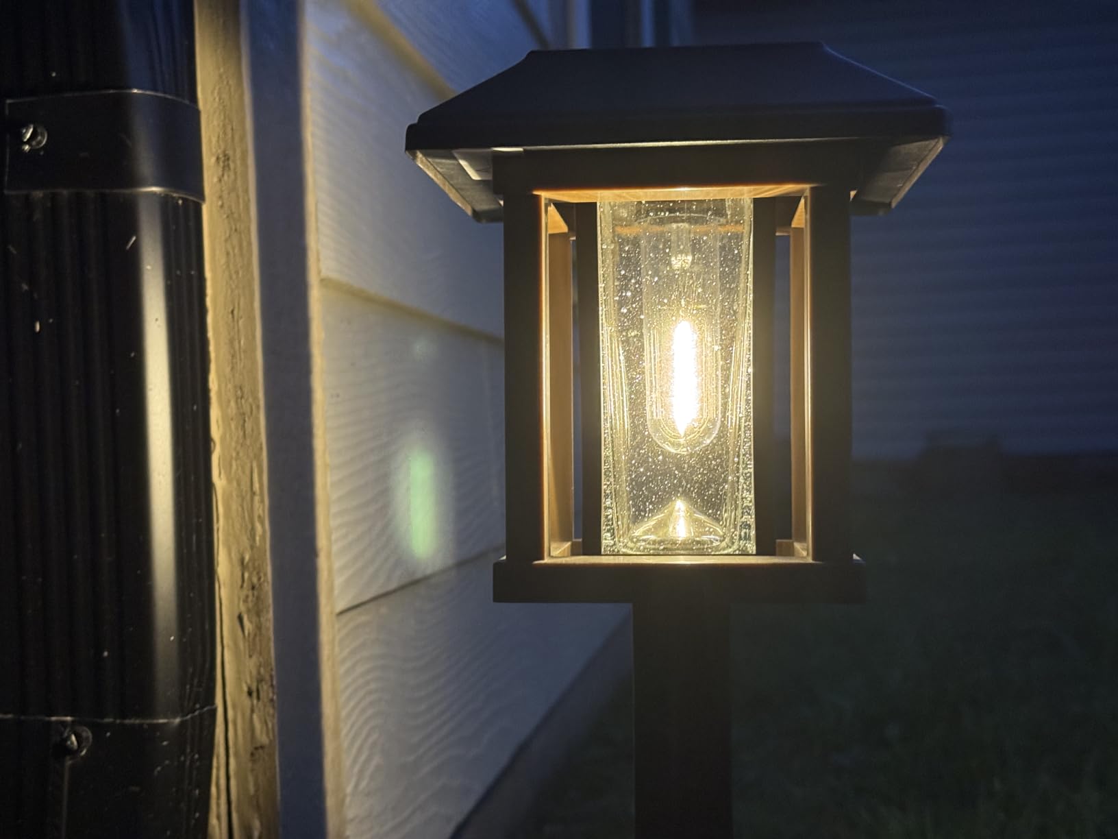 XMCOSY+ 4-Pack Solar Pathway Lights Outdoor, 25 Lumens Vintage Edison LED Landscape Lighting, IP65 Waterproof Seeded Glass & Metal Stakes customer photo 1