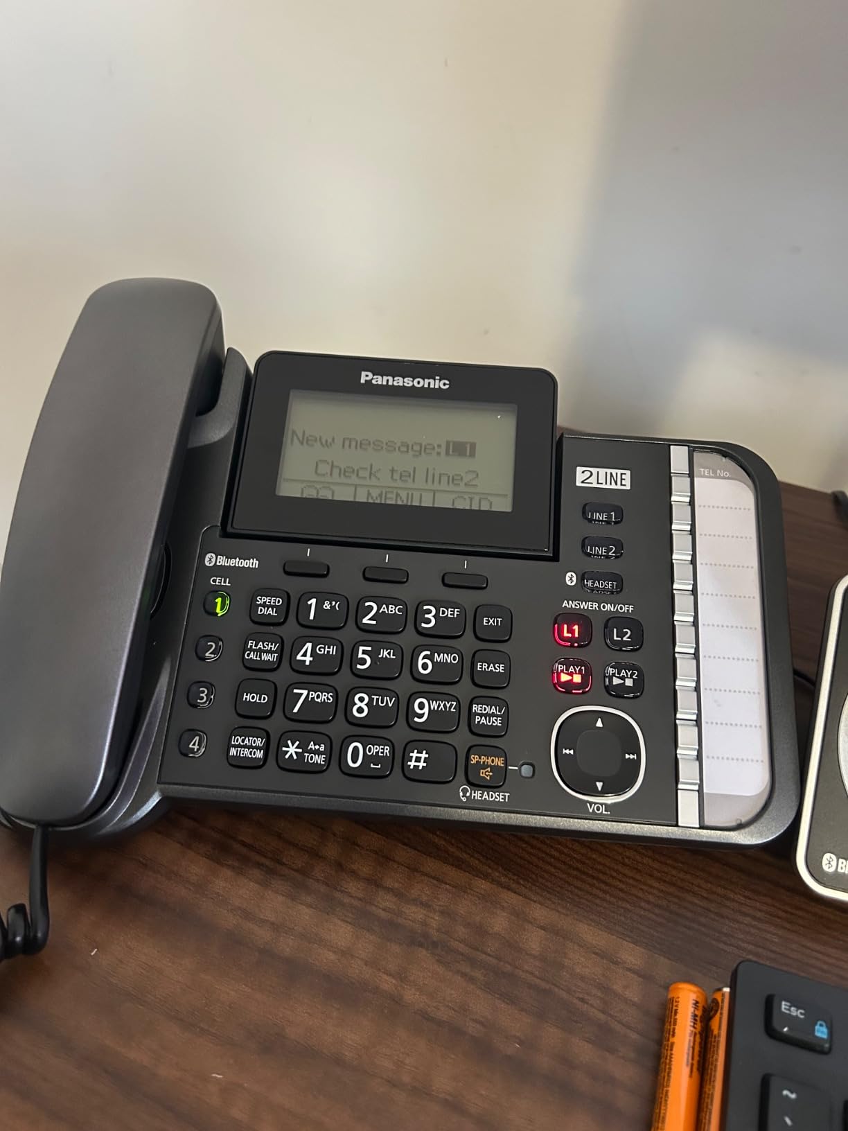 Panasonic 2-Line Corded Phone/Cordless Phone System with 2 Handsets - Answering Machine, Link2Cell, 3-Way Conference, Call Block, Long Range DECT 6.0, Bluetooth - KX-TG9582B (Black) customer photo 1