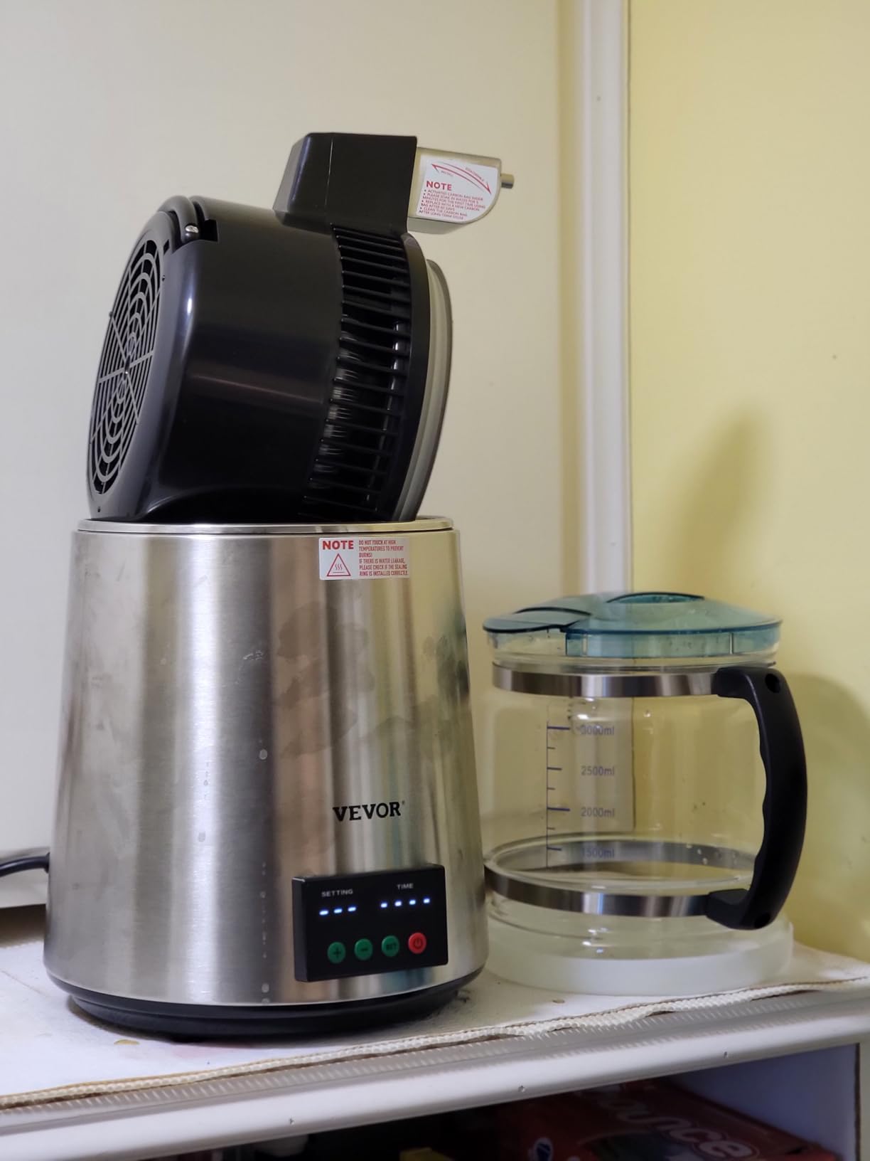 VEVOR 1.1 Gal Water Distiller, 0.3 Gal/H, Distilled Water Maker Machine 750W 0-99H Timing Set Temp Display, 304 Stainless Steel Countertop Distiller Glass Carafe Cleaning Powder 3 Carbon Packs, Silver customer photo 2