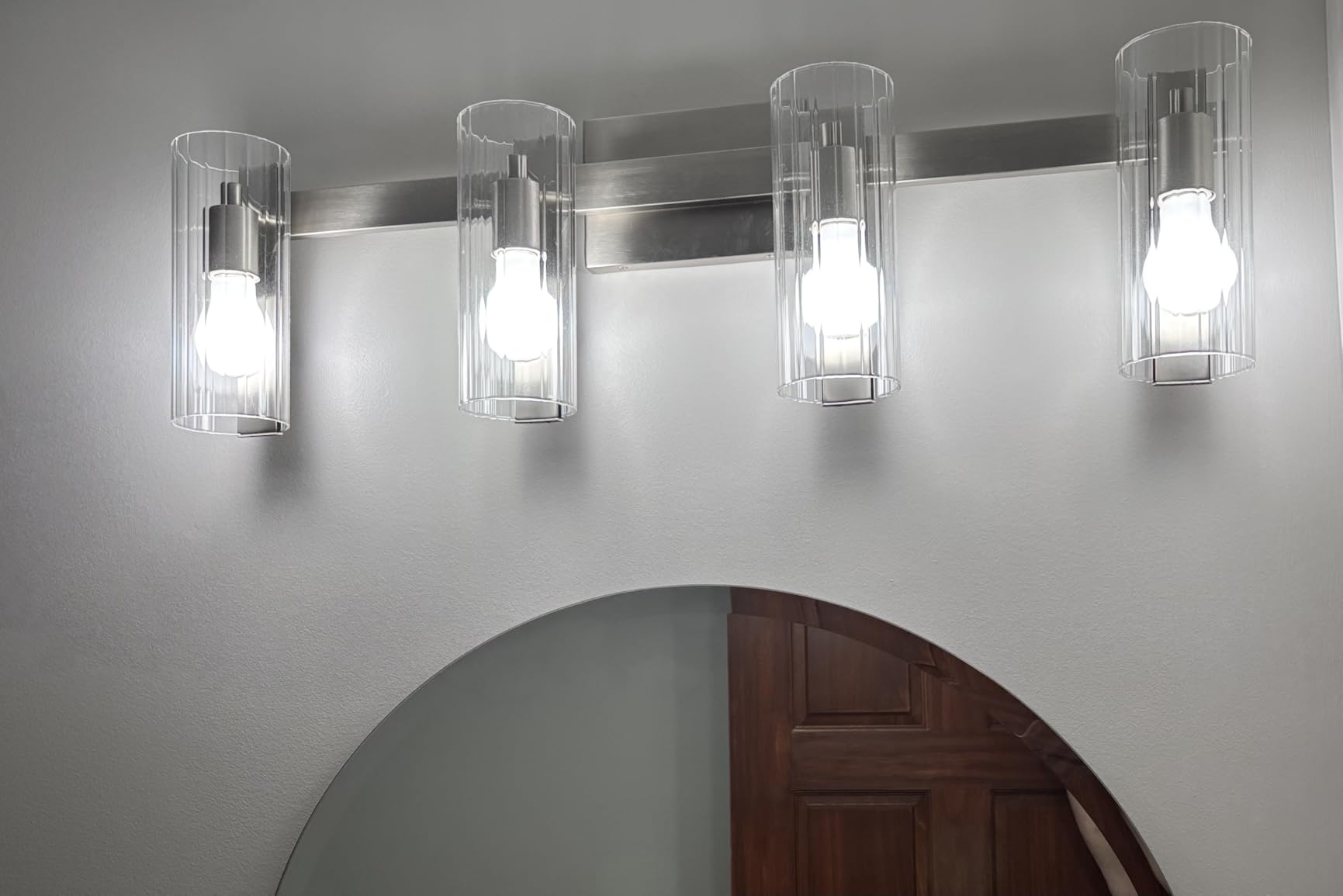 Kichler Jemsa 3-Light Bathroom Vanity Light Fixture with Clear Fluted Glass in Champagne Bronze for Modern Bathroom or Powder Room Wall Lighting (9.75 x 22.75 in), 55168CPZ customer photo 1