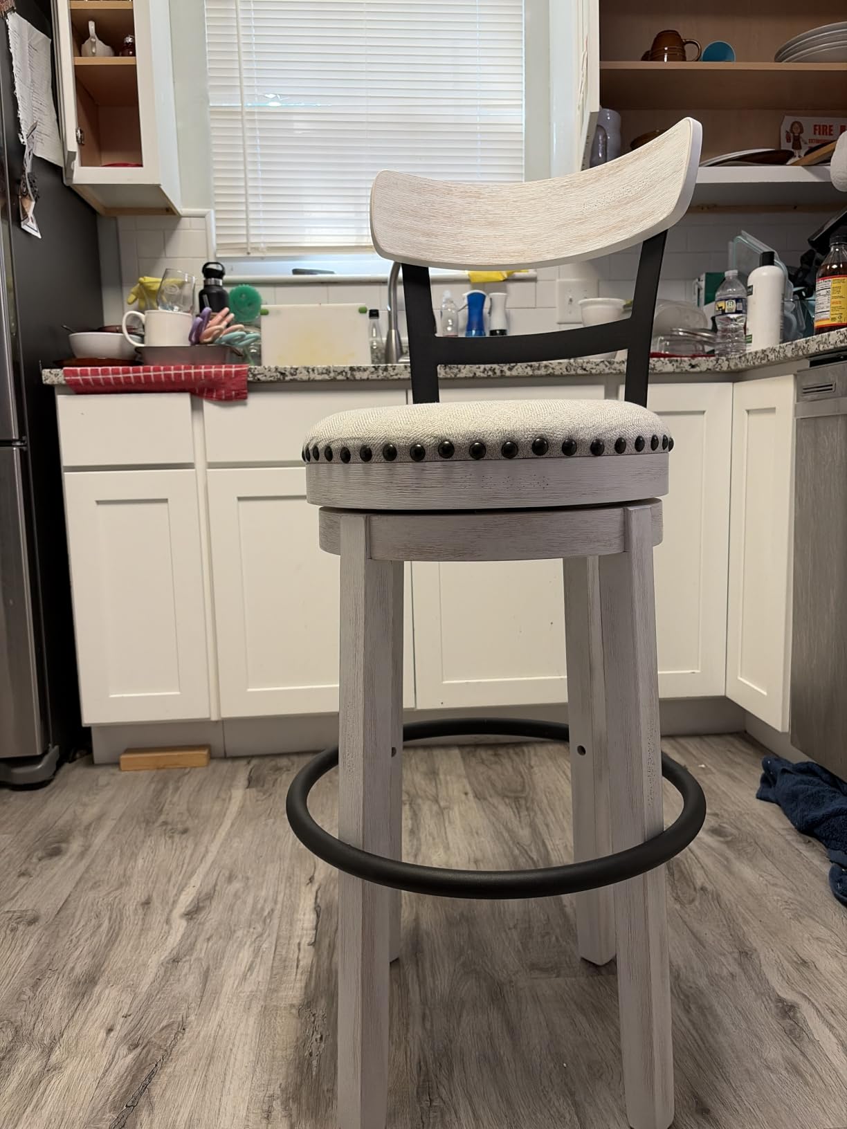Signature Design by Ashley Pinnadel Bar Stool, Swivel Counter Height Stool Chair With Faux Leather Seat, Wood and Metal Frame for Kitchen Island With Seating, Light Brown customer photo 1