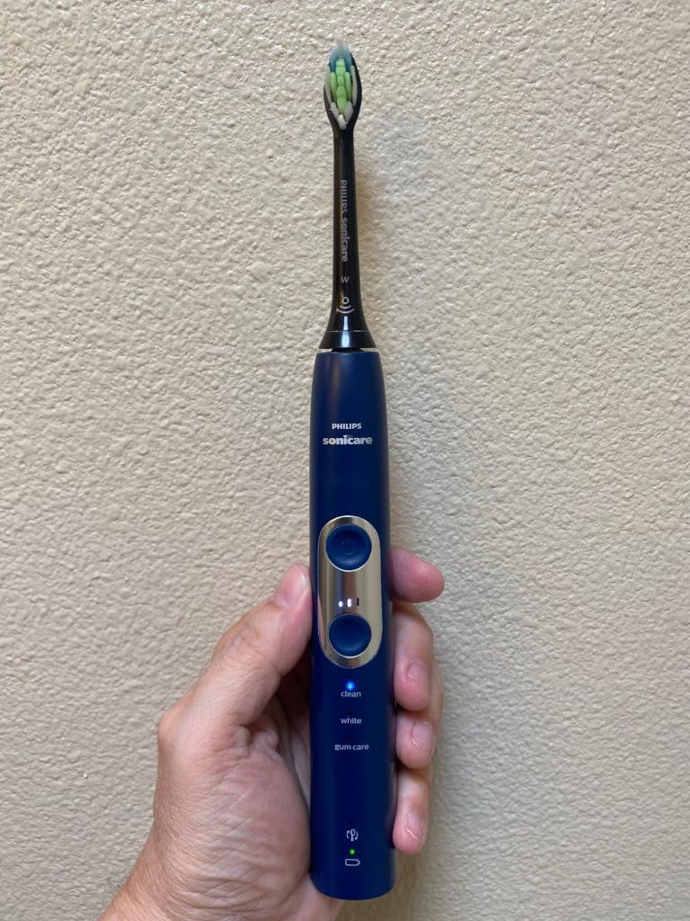 Philips Sonicare ProtectiveClean 6100 Rechargeable Electric Toothbrush, with Pressure Sensor, 3 Cleaning Modes, SmarTimer and QuadPacer, 14-Day Battery Life, Travel Case, Deep Purple, Model HX6471/03 customer photo 1