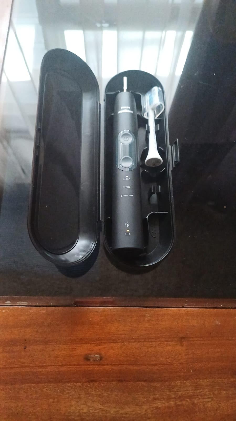 Philips Sonicare ProtectiveClean 5300 Rechargeable Electric Toothbrush, with Pressure Sensor, 3 Cleaning Modes, SmarTimer and QuadPacer, with 2 Bonus Brush Heads, Travel Case, Black customer photo 1