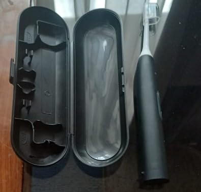 Philips Sonicare ProtectiveClean 5300 Rechargeable Electric Toothbrush, with Pressure Sensor, 3 Cleaning Modes, SmarTimer and QuadPacer, with 2 Bonus Brush Heads, Travel Case, Black customer photo 2