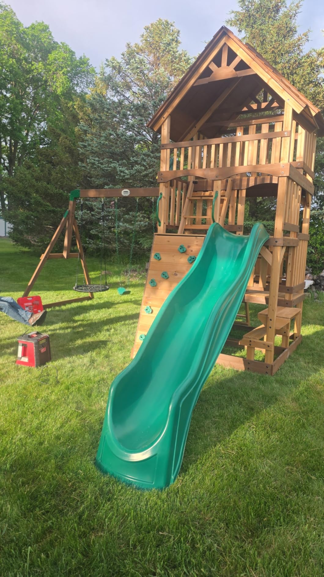 Backyard Discovery Highlander Cedar Wood Swing Set with Wave Slide, Three-Story Clubhouse, Rock Wall, Picnic Table, Belt Swings, Web Swing, Sandbox, Three Ladders, Toy Accessories, Outdoor Playset customer photo 1