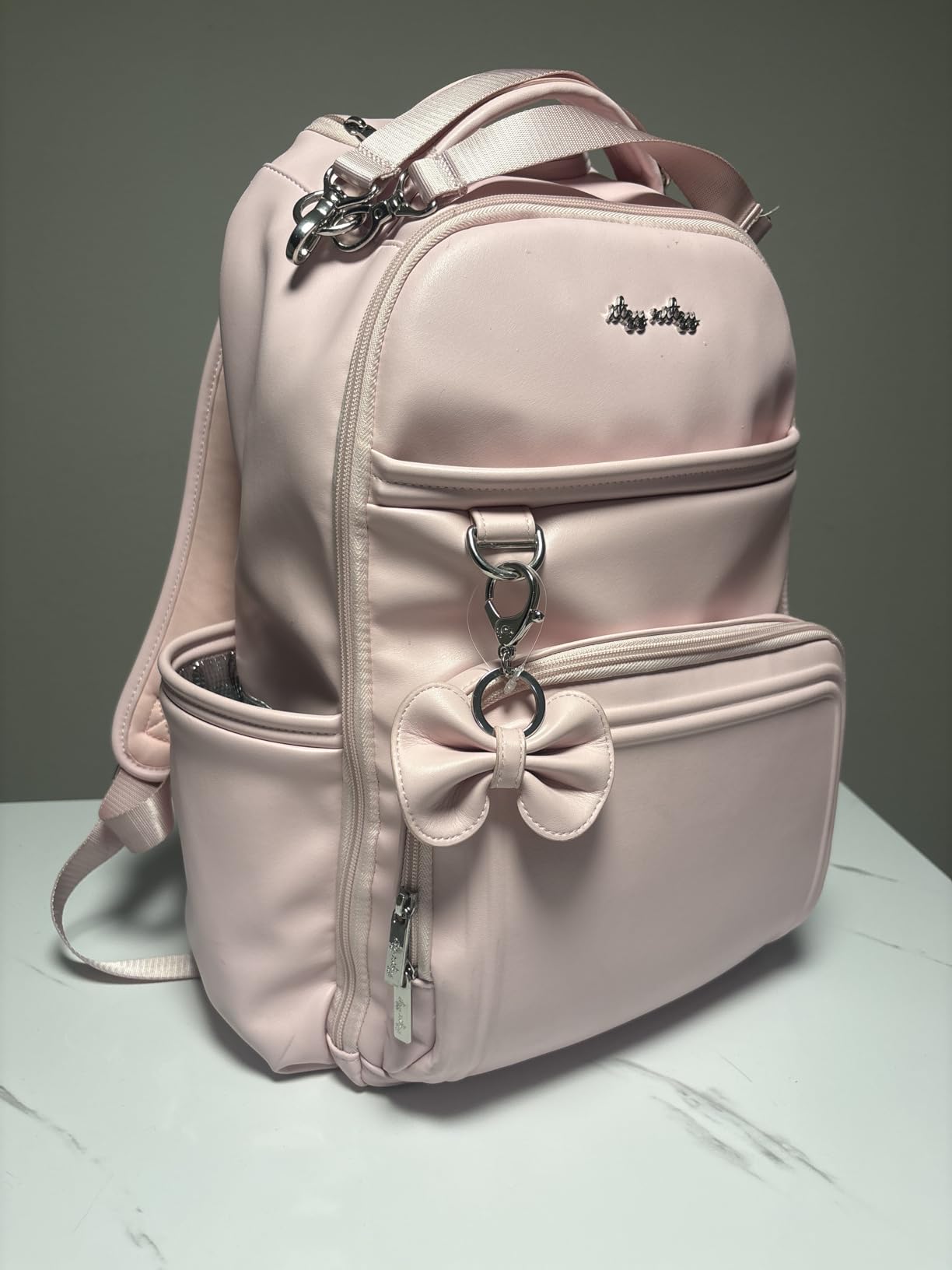Itzy Ritzy Diaper Bag Backpack - Large Capacity Boss Plus Baby Backpack Diaper Bag Featuring 19 Pockets, Changing Pad, Stroller Clips, and Comfortable Straps (Vanilla Latte) customer photo 1