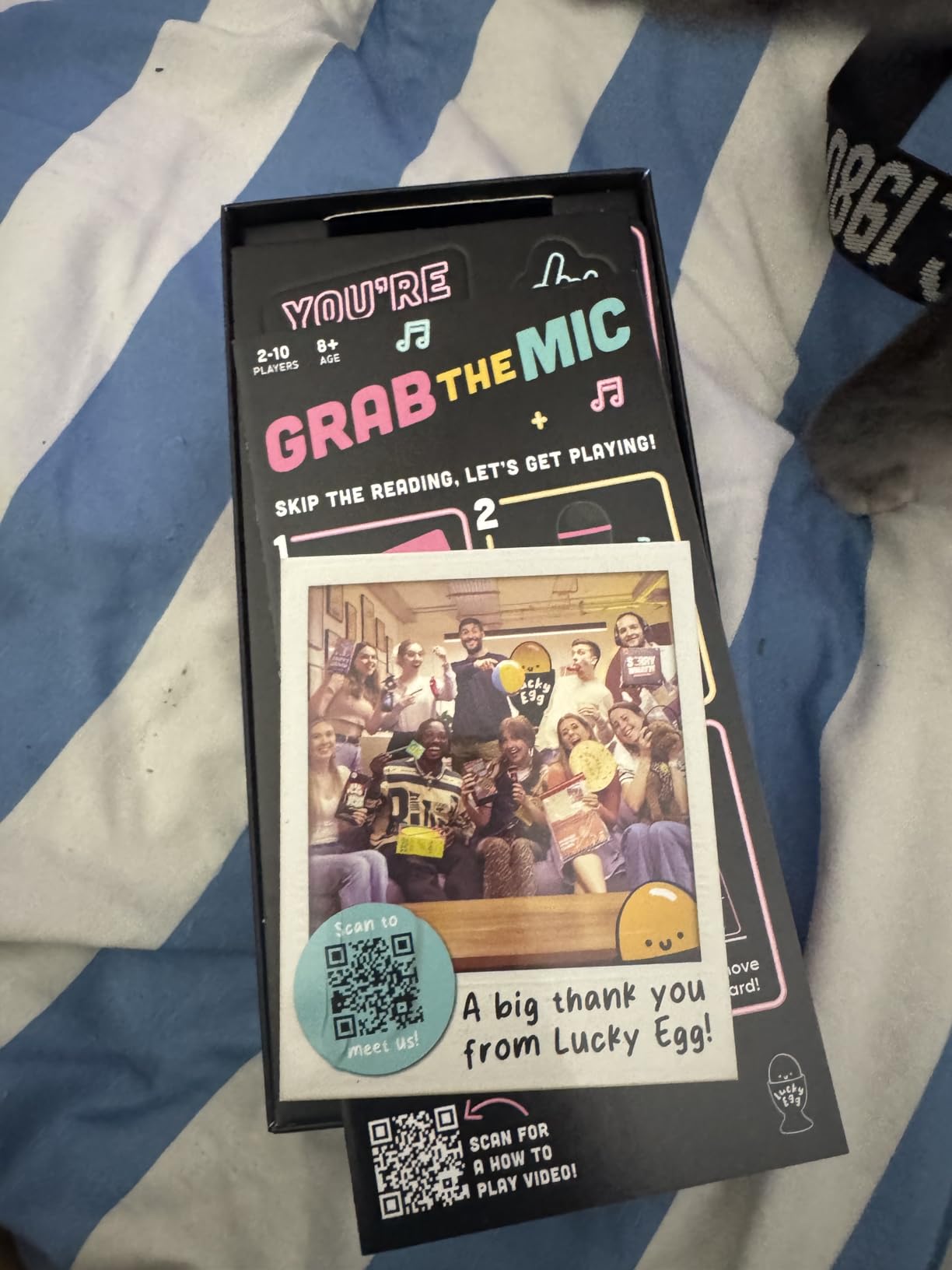 Lucky Egg Official Grab The Mic - Family Karaoke Board Game w/Foam Mic, 8+ Ages, 2-10 Players - Games for Bad Singers w/ 230 Lyrics (115 Cards) customer photo 1