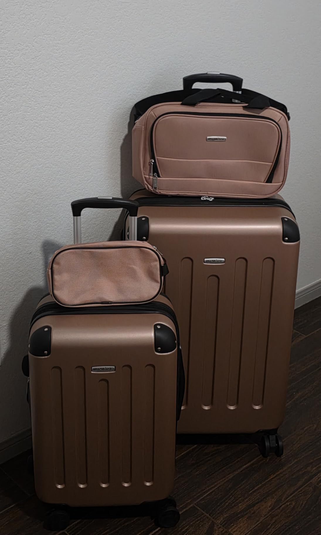 Amazon Basics 4-Piece Luggage Set, Hardside Spinner Suitcases with Multidirectional Wheels (22 Carry-On and 28 Checked), Plus 15-inch Tote Bag and 10-inch Compact Travel Bag, Rose Gold customer photo 2