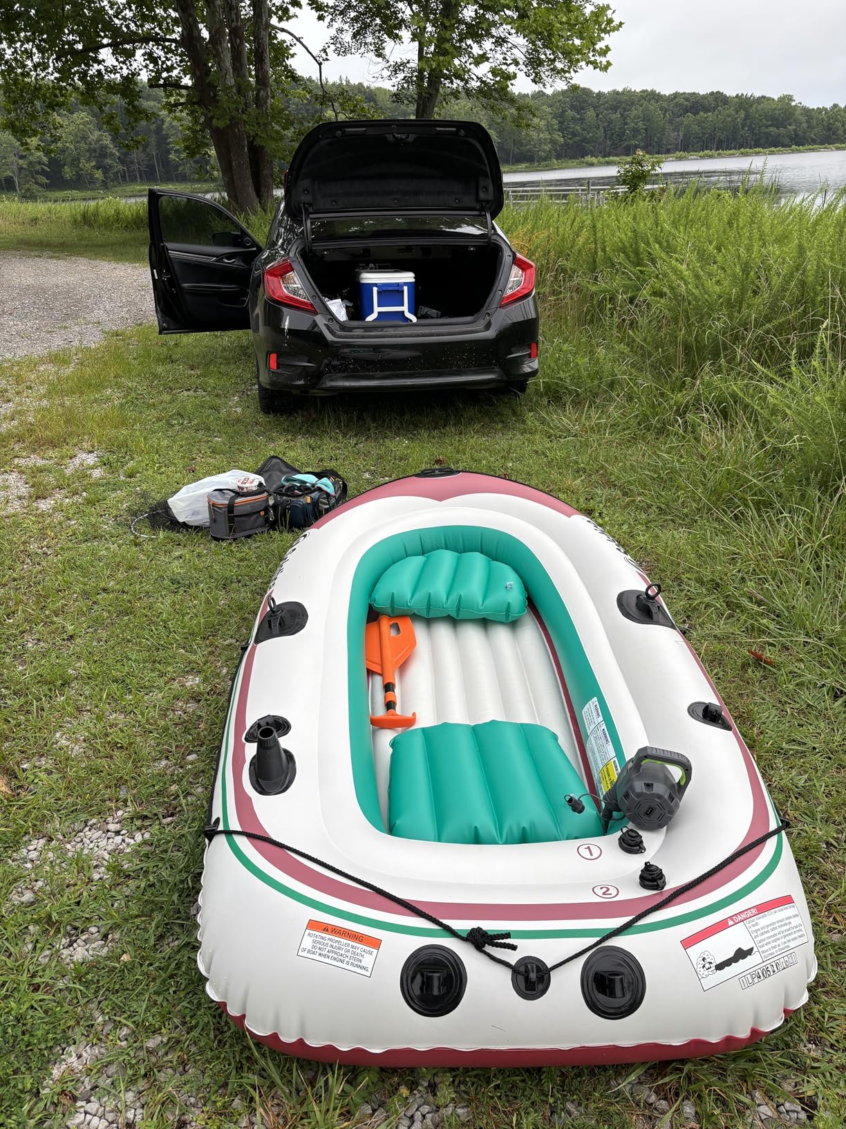 Solstice Voyager 4-Person Inflatable Fishing Boat with Dual Swivel Oar Locks and Rod -Holder, Motor Compatible 9' x 5' customer photo 1