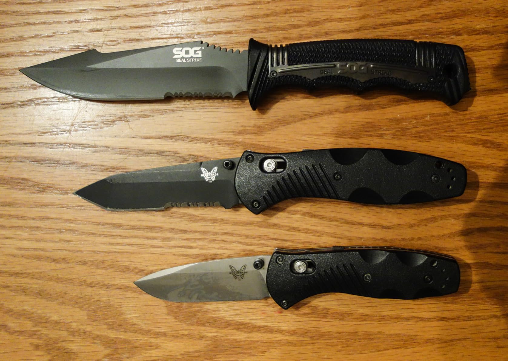 SOG Seal Strike Fixed Blade Knife with Sheath- Tactical and Hunting Knife with 4.9 Inch Partially Serrated Bowie Knife Blade and Survival Knife Line Cutter (SS1003-CP) customer photo 1