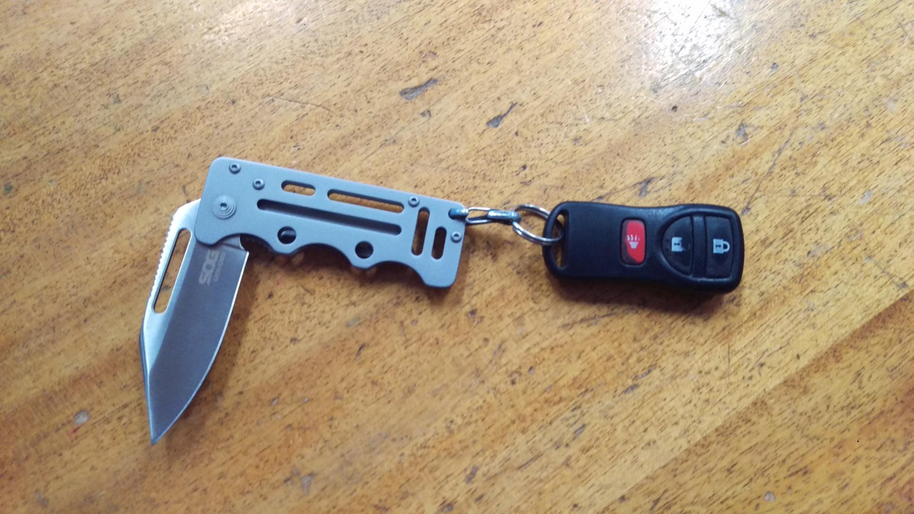 SOG Cash Card Money Clip Pocket Knife- 2.75 Inch Blade EDC Knife with Clip for Pocket, Money or Card Holder, Stainless Steel Handle with Built-In Lanyard Hole (EZ1-CP) customer photo 2