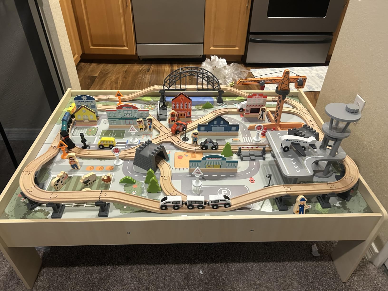 Amazon Basics 120 Piece Wooden Train Set with Activity Table - Sturdy Tracks, Storage Bin, Kids Gift for Age 3+ customer photo 1