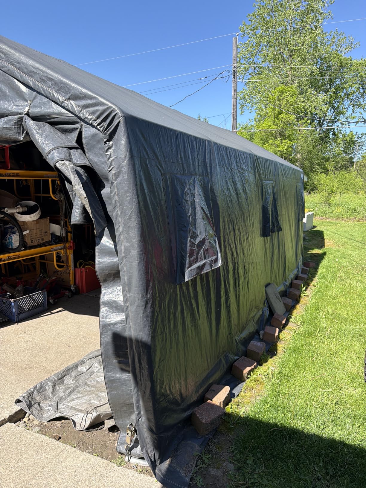 ADVANCE OUTDOOR 10X15 ft Garage Shelter Steel Metal Peak Roof Portable Storage Shed Carports for Motorcycle Boat, or Garden Tools with 2 Roll up Doors & Vents, Beige customer photo 2