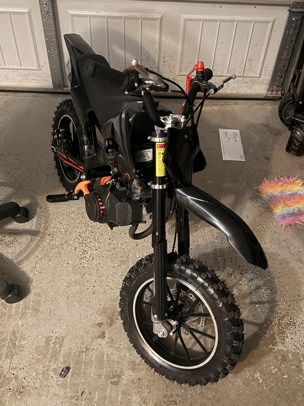 Kids 50cc Dirt Bike, 2-Stroke Gas Dirt Bike, Black | Kids Dirt Bike for 8-14 with Front Rear Disc Brakes, 10in Off-Road Tires, Shock Absorption, Seat Height 23.6in, Max Speed 40Mph customer photo 1