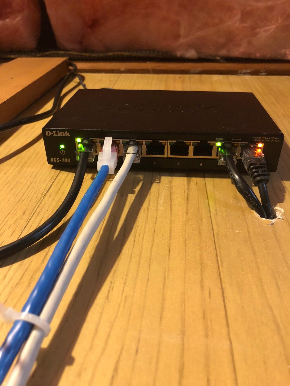 D-Link DGS-108 8 Port Gigabit Ethernet Switch Unmanaged, Network Splitter, Silent Fanless, Network Hub, Sturdy Metal with Shielded Ports, Compact Desktop/Wall Mount, QoS, Energy Saving, Plug and Play customer photo 2