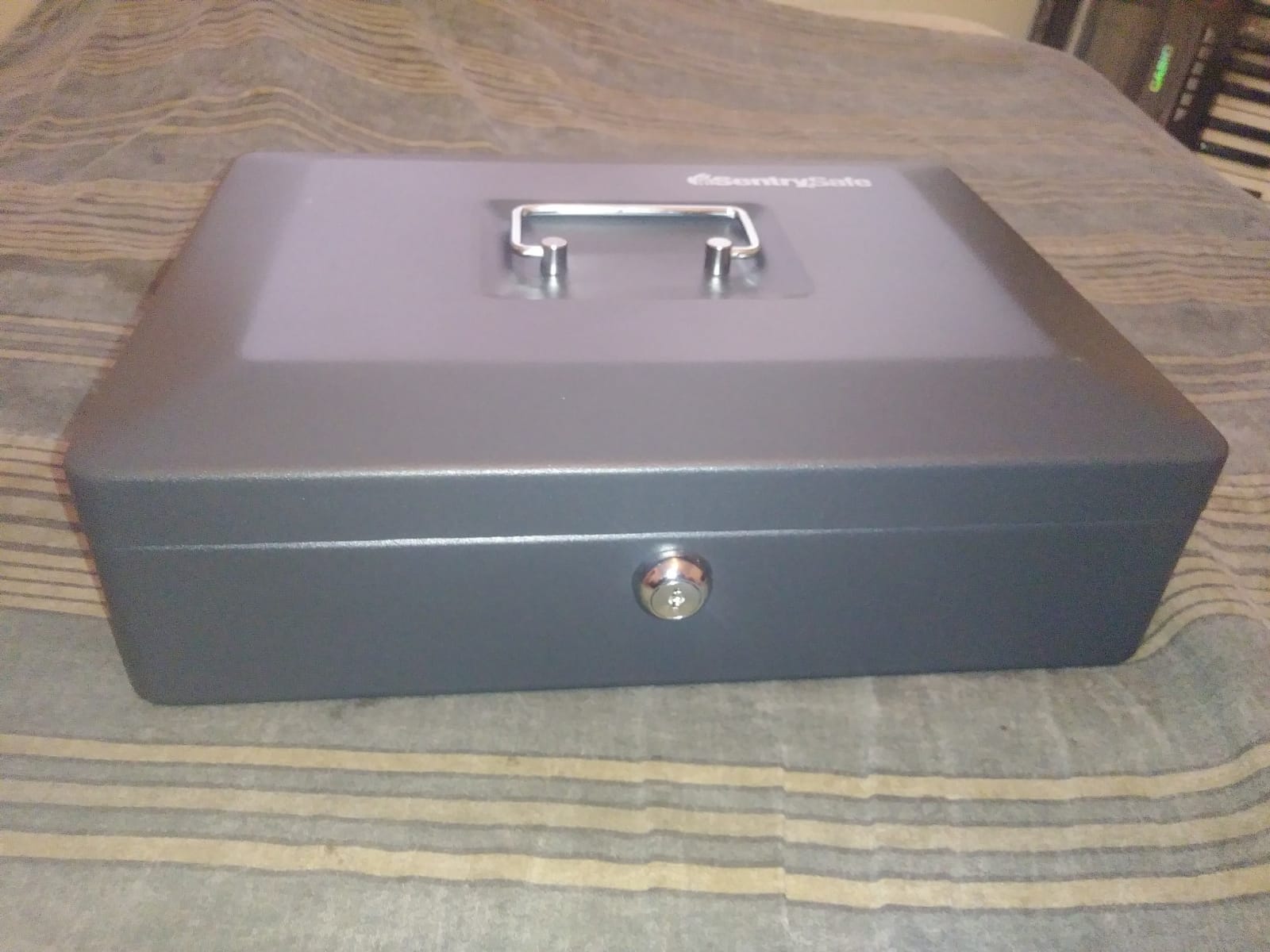 SentrySafe Black Money Saving Box with Cash Tray and Key Lock, Portable Safe Box with Carrying Handle, 0.21 Cubic Feet, 3.75 x 12 x 9.3 Inches, CB-12 customer photo 2