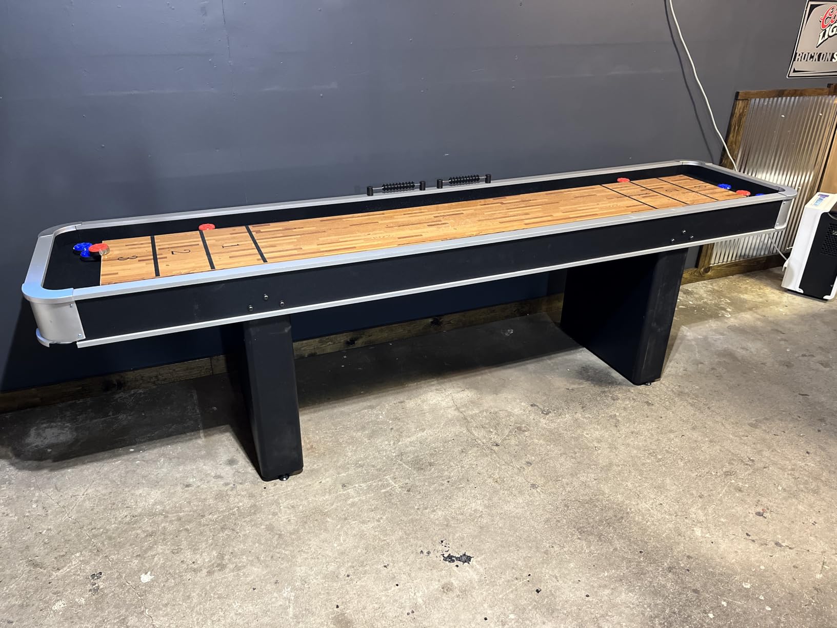 Atomic 9' LED Shuffleboard Tables with Poly-Coated Playing Surface for Smooth, Fast Puck Action and Pedestal Legs with Levelers for Optimum Stability and Level Play customer photo 2